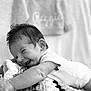 Reginald joined the competition — help win amazing prizes! baby, smile, laughing, infant, blanket, knitted, texture, black_and_white, crawling, happy, clothing, soft, portrait, cute, young_child, indoors, cozy, toddler, head, expression