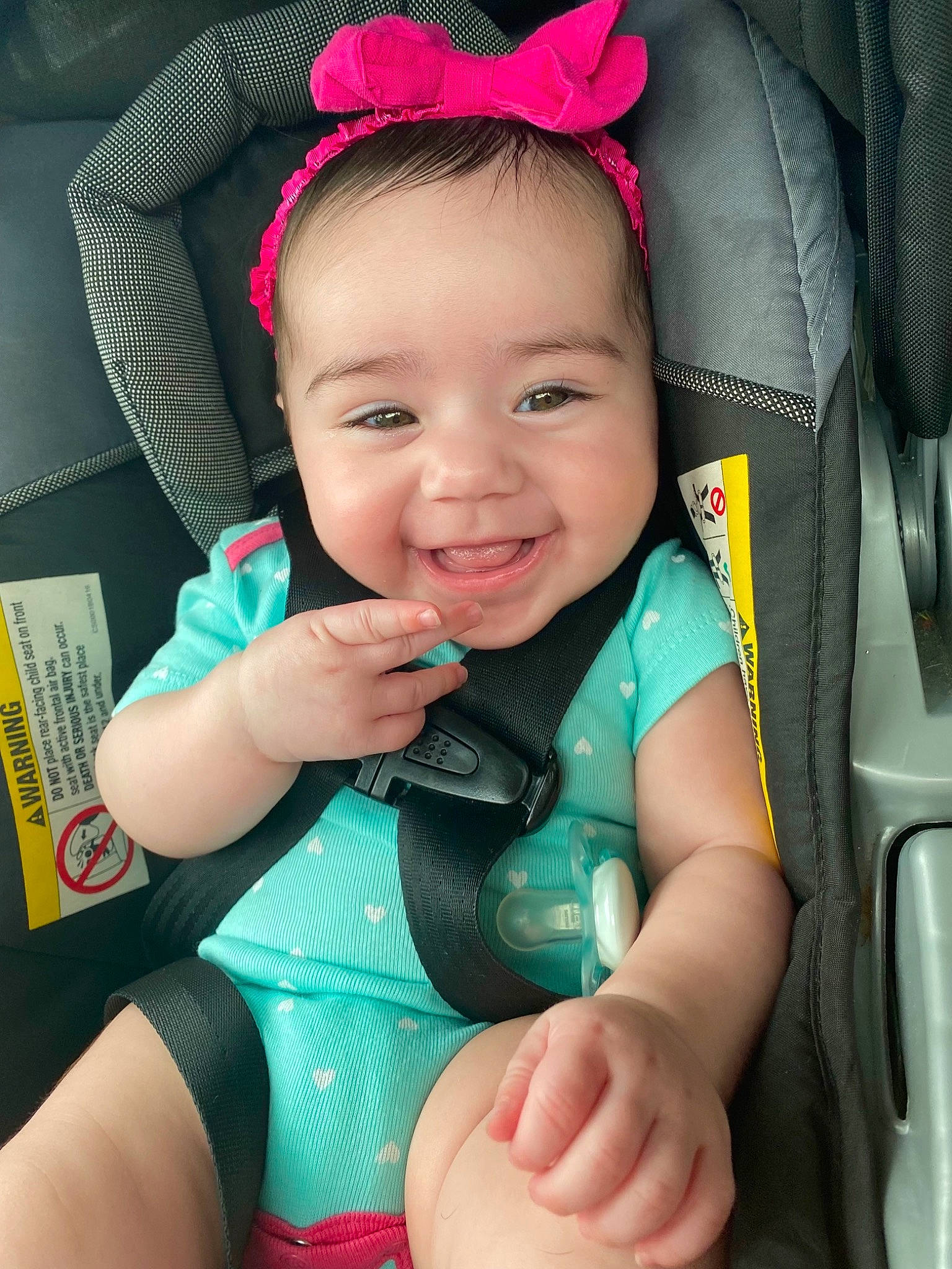 Analisse is registered to the contest to win money with this photo: arm, baby, baby_toddler_clothing, cheek, chin, eye, eyelash, finger, gesture, hand, happy, head, iris, joy, organ, person, photograph, product, skin, sleeve