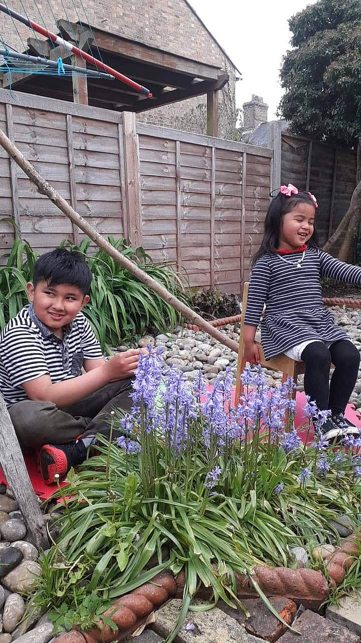 Ate Sissy Chelsea joined the competition — help win amazing prizes! annual_plant, botany, community, electric_blue, floristry, flower, flowering_plant, garden, grass, grass_family, groundcover, joy, leisure, person, plant, public_space, purple, smile, spring, terrestrial_plant