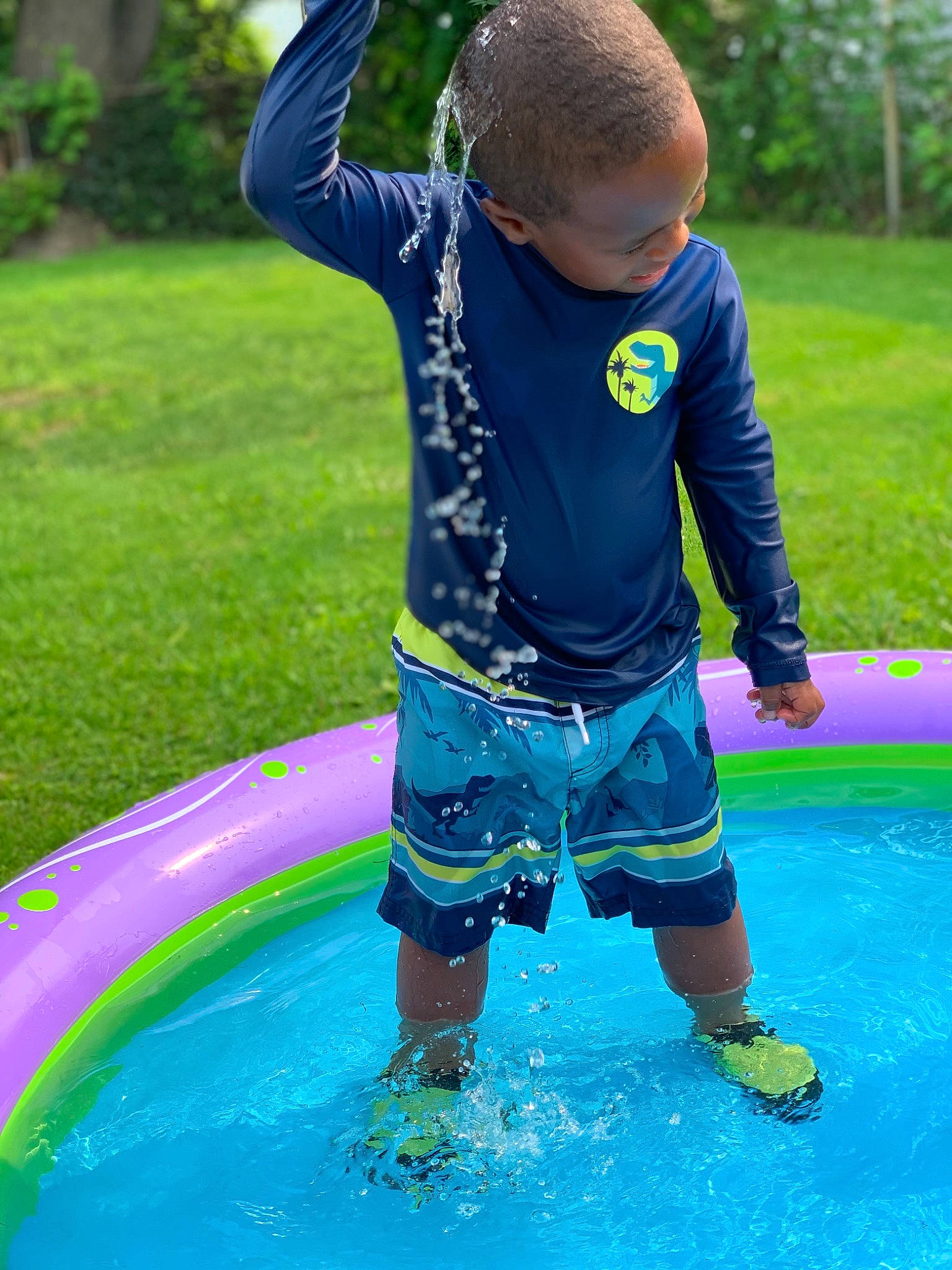 Kai joined the competition — help win amazing prizes! child, electric_blue, fun, games, grass, green, happy, inflatable, leisure, nature, people_in_nature, person, photograph, plant, playground, recreation, shorts, t_shirt, toddler, water