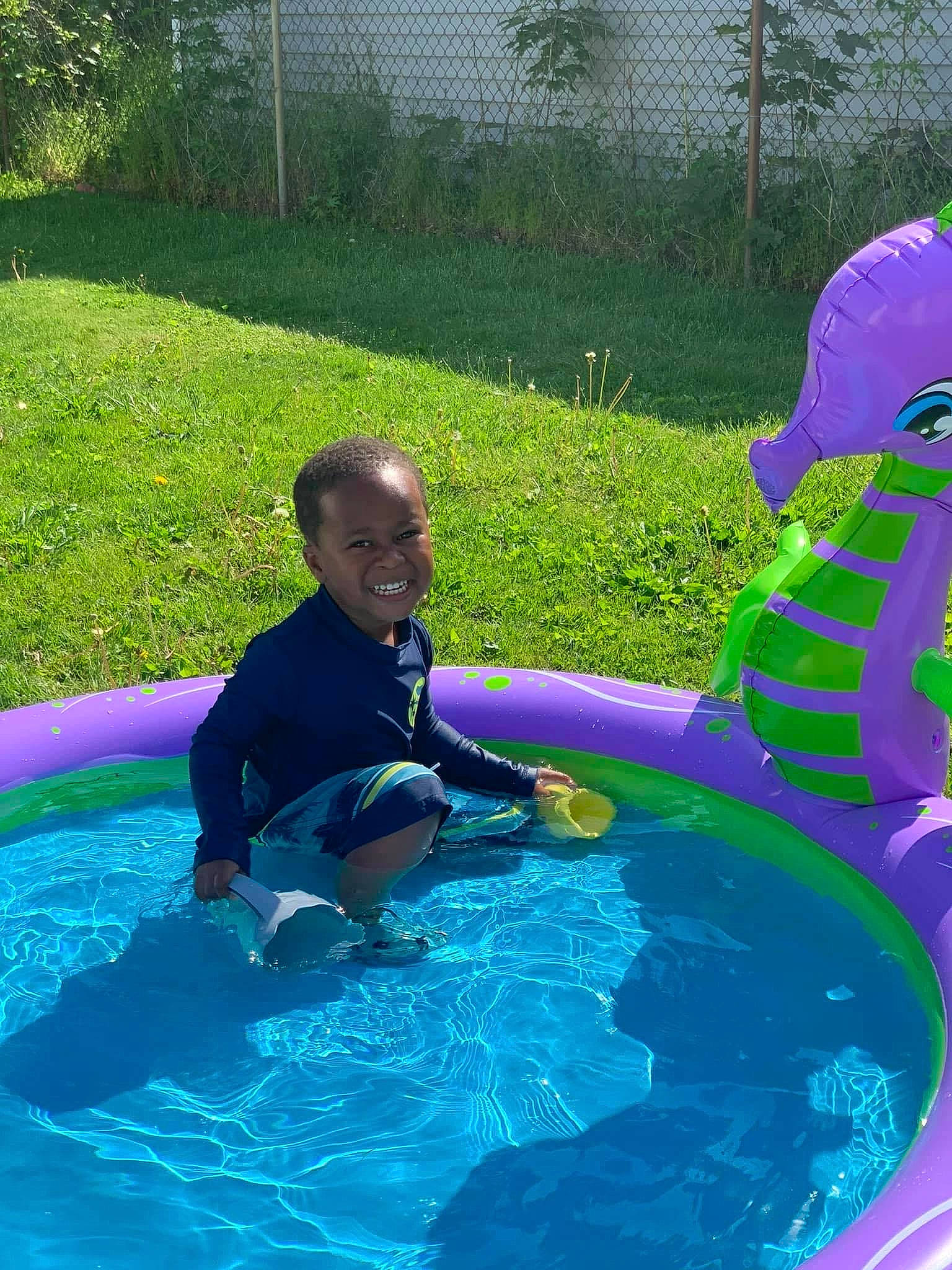 Kai joined the competition — help win amazing prizes! aqua, azure, child, electric_blue, fun, games, grass, happy, inflatable, joy, leisure, liquid, person, plant, play, recreation, smile, swimming_pool, toddler, vacation