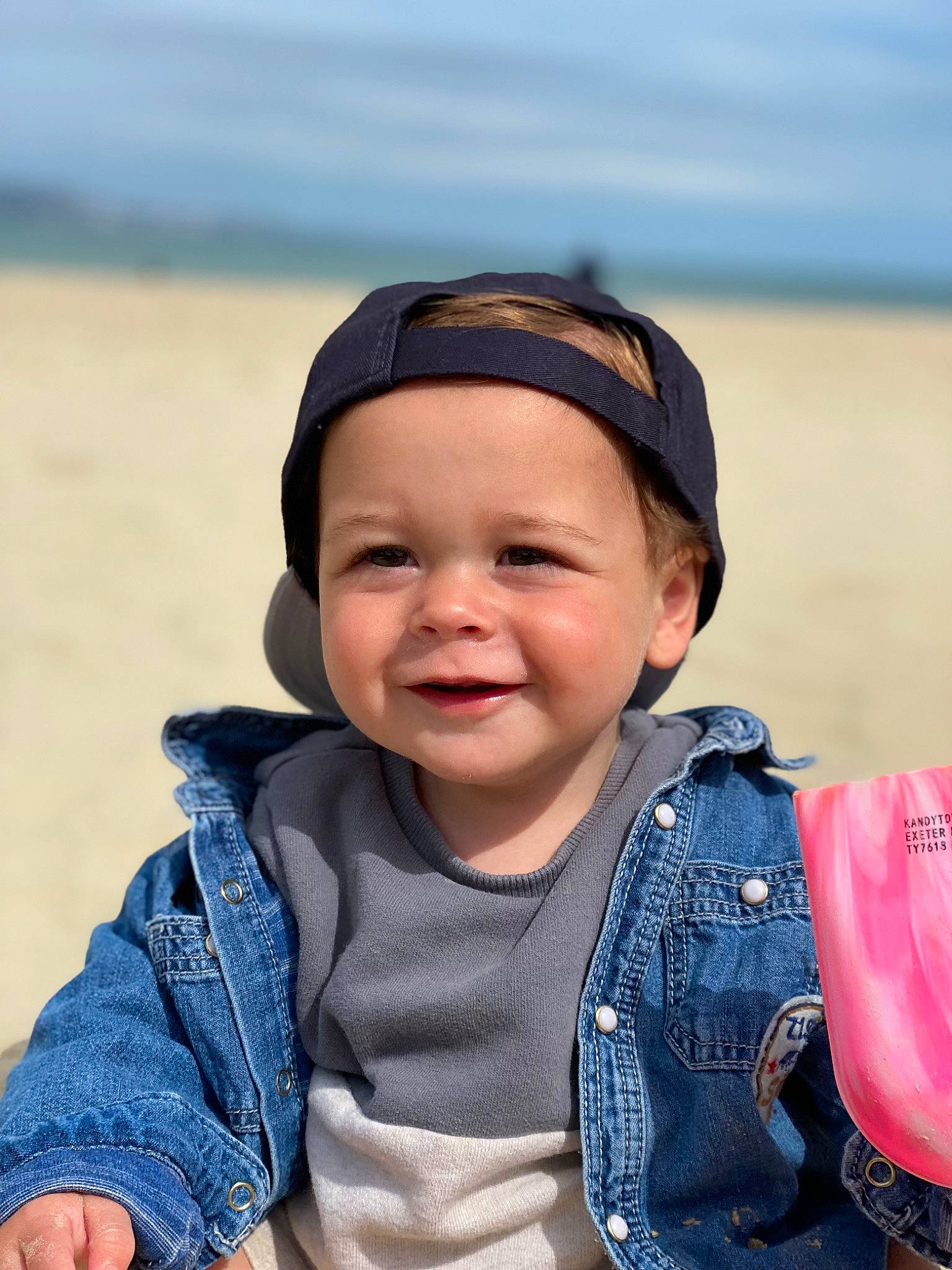 Albert joined the competition — help win amazing prizes! baby, bag, beach, child, electric_blue, fun, happy, head, headwear, joy, landscape, leisure, luggage_and_bags, people_in_nature, person, personal_protective_equipment, recreation, sand, skin, sky
