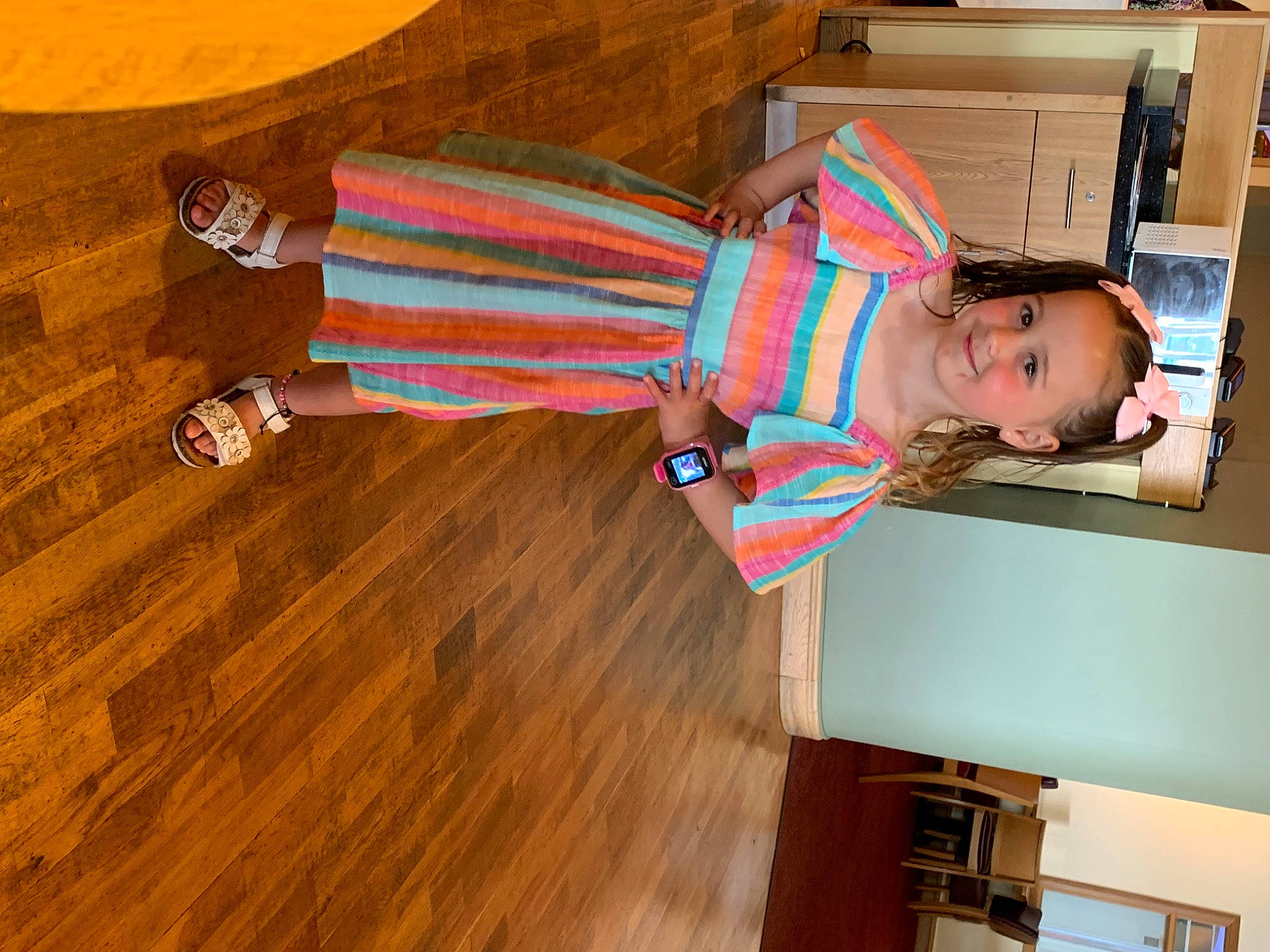 Mabel is registered to the contest to win money with this photo: baby, baby_toddler_clothing, child, flooring, foot, fun, hardwood, human_leg, joy, laminate_flooring, leisure, pattern, person, plank, room, smile, thigh, toddler, varnish, wood