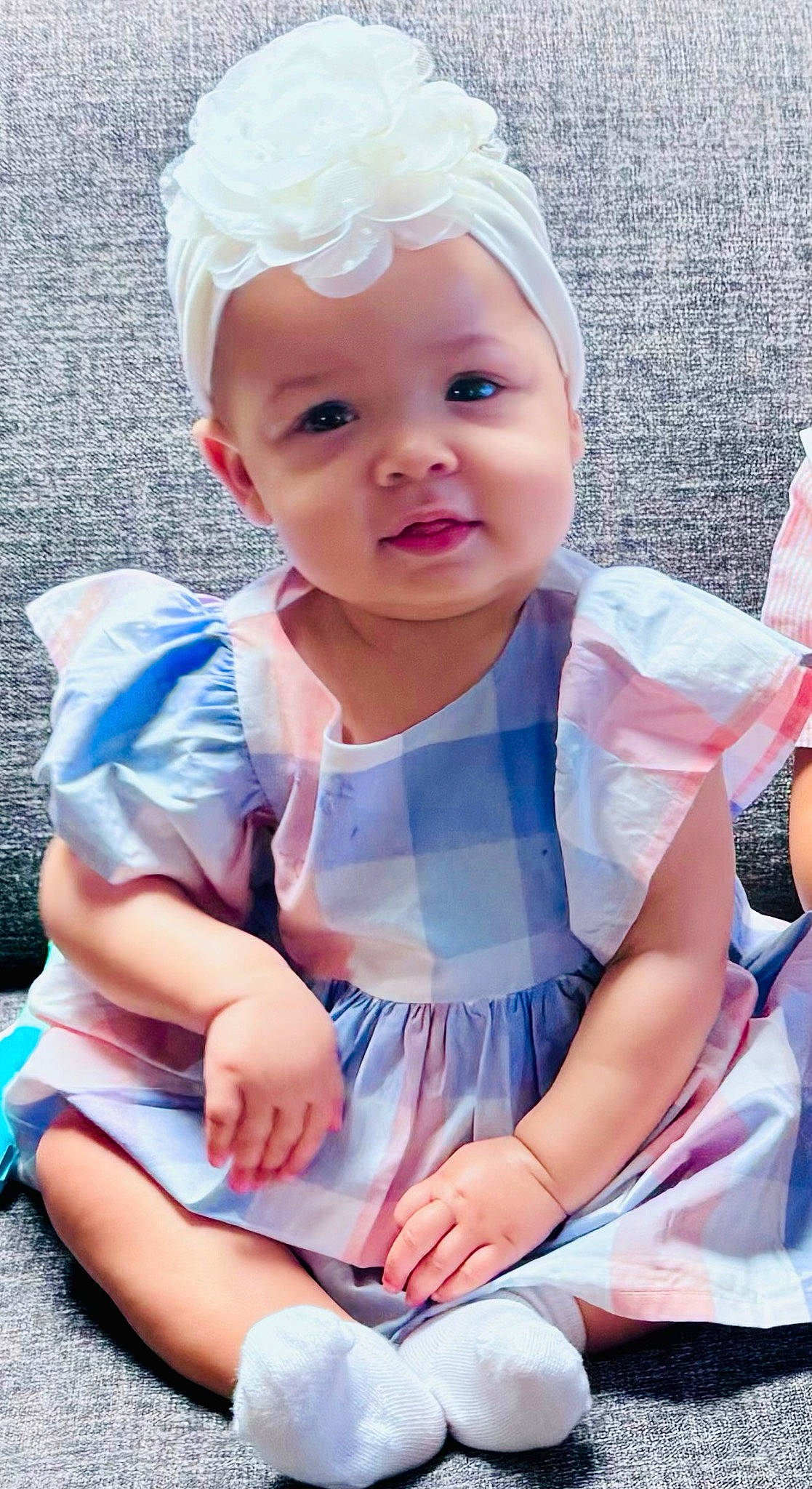 Sariyah is registered to the contest to win money with this photo: baby, baby_toddler_clothing, beauty, blue, cheek, child, dress, eye, finger, gesture, hairstyle, happy, lip, person, pink, skin, sleeve, smile, summer, toddler