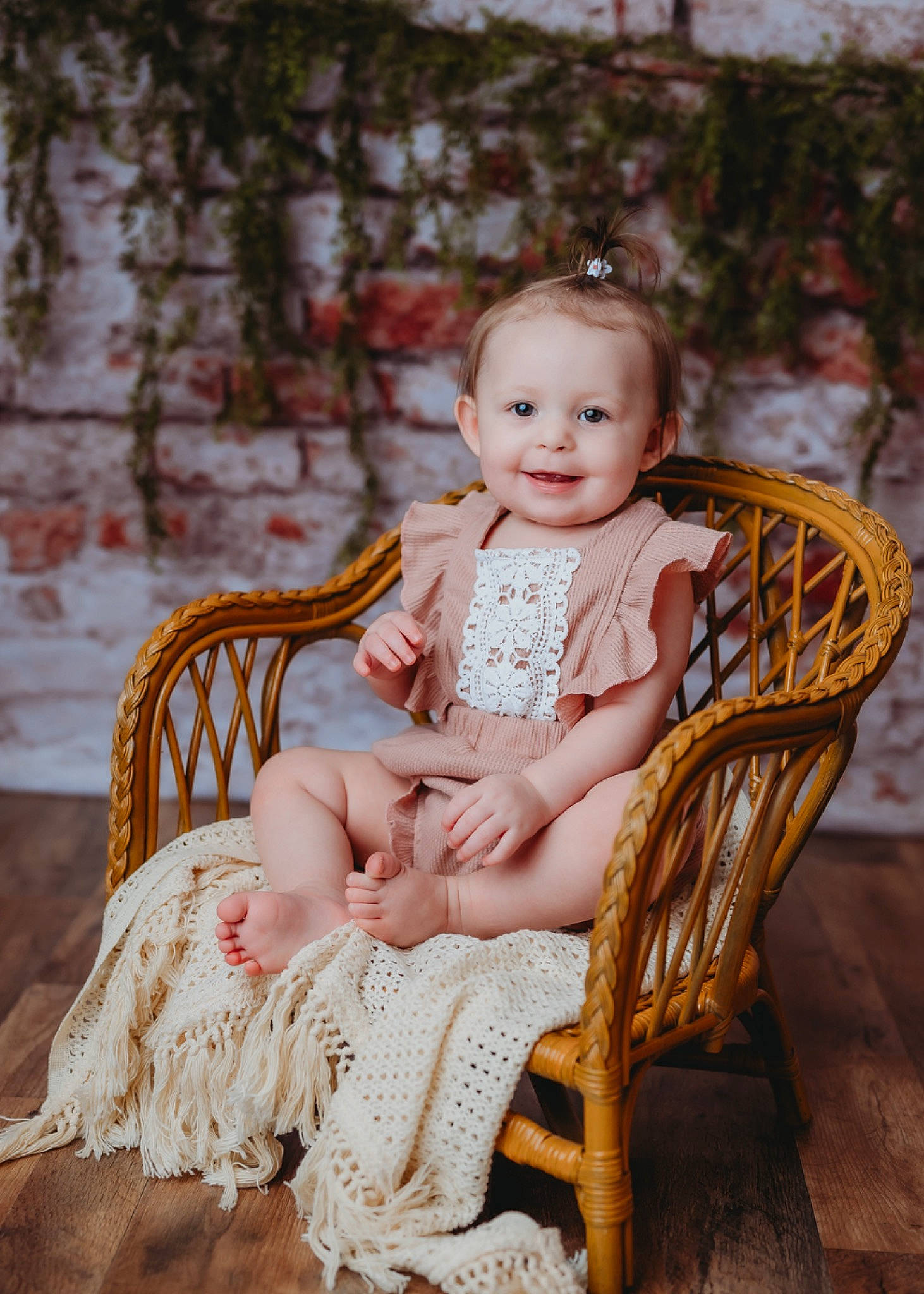 Alison is registered to the contest to win money with this photo: baby, baby_toddler_clothing, chair, cheek, child, dress, eye, facial_expression, flash_photography, furniture, grass, happy, head, iris, joy, person, plant, sitting, skin, smile