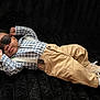Jai Ceon joined the competition — help win amazing prizes! baby, beige_pants, black_background, blue_checkered_shirt, casual_clothing, child, cool, cute, fashion, indoor, infant, lying_down, person, portrait, relaxed, sneakers, stylish, sunglasses, suspenders, young_child