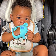 Jai Ceon is registered to the contest to win money with this photo: baby, car_seat, teething_toy, bib, socks, infant, child, cute, portrait, indoor, striped, headrest, clothing, seatbelt, smiling, baby_toy, closeup, cute_baby, young_child, happy