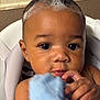Jai Ceon is registered to the contest to win money with this photo: baby, child, face, head, skin, eyes, hands, cloth, bath, bubbles, shampoo, seat, curly_hair, closeup, indoor, cute, infant, expression, portrait, person