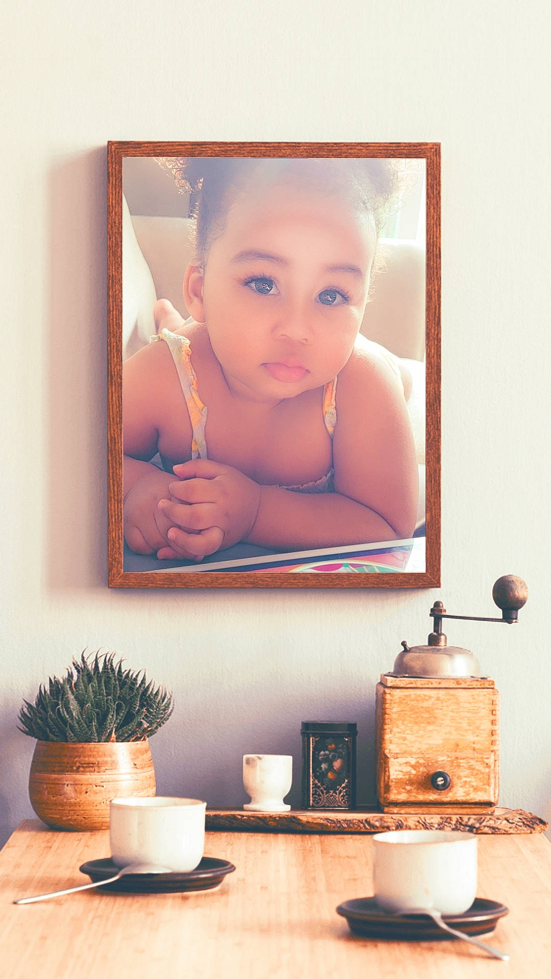 Izabella is registered to the contest to win money with this photo: art, baby, beauty, flowerpot, houseplant, living_room, painting, person, photograph, picture_frame, plant, rectangle, room, serveware, shelf, shelving, toddler, visual_arts, wall, white