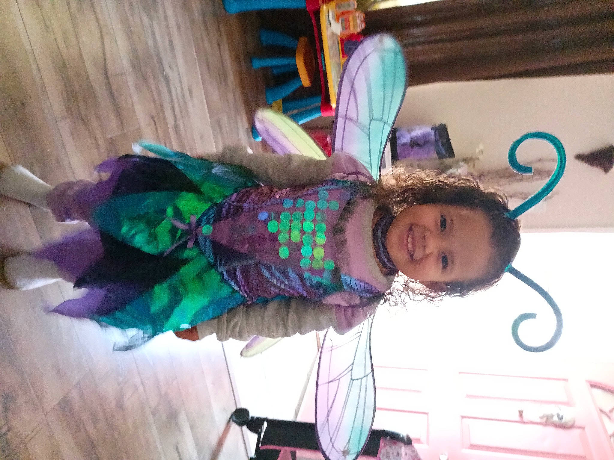 Lyric joined the competition — help win amazing prizes! child, costume, event, fashion_accessory, feather, fun, happy, hat, joy, leisure, magenta, party, party_supply, person, pink, purple, room, smile, tire, toddler