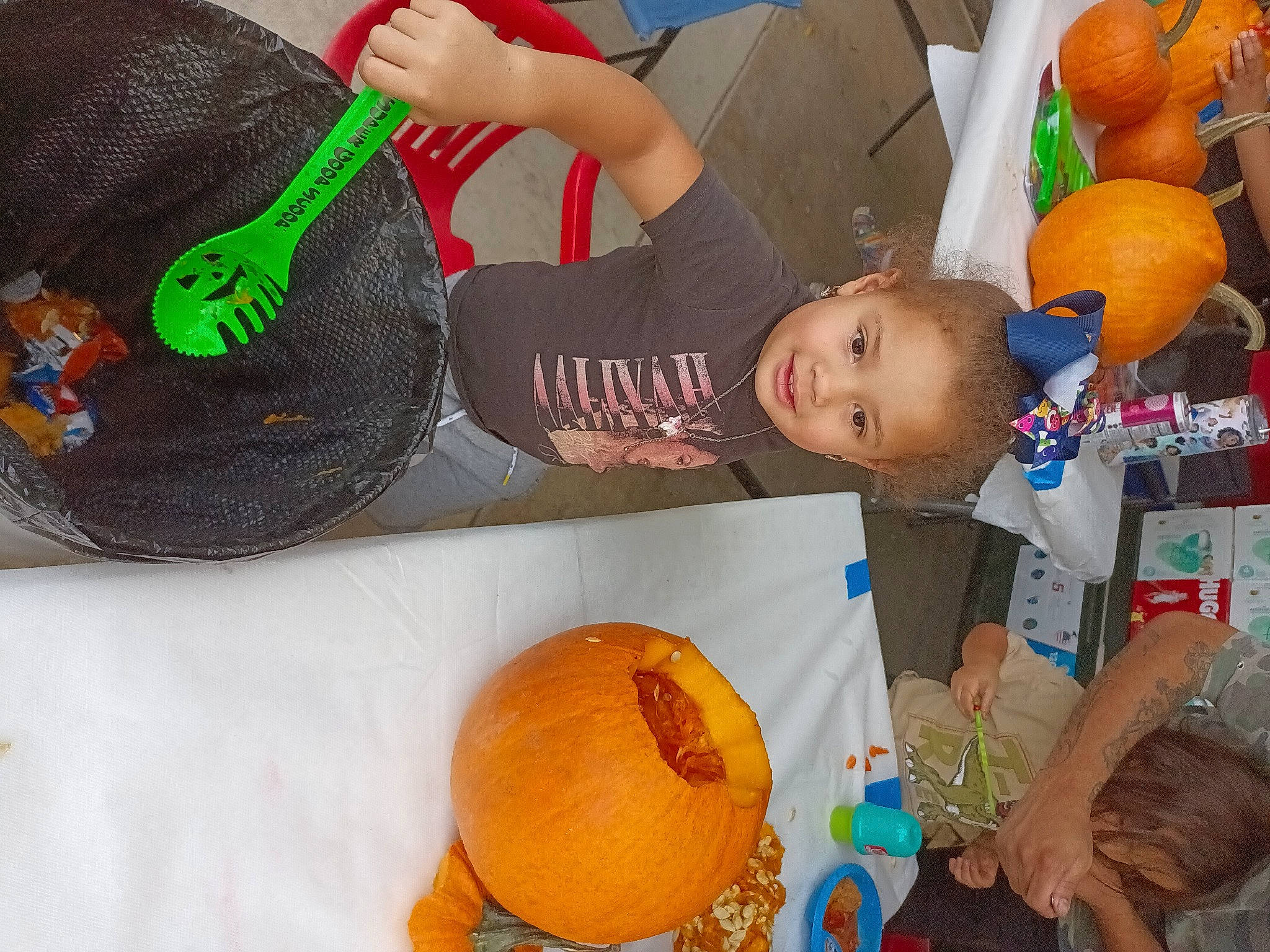 Lyric is registered to the contest to win money with this photo: baby, calabaza, child, comfort, cucurbita, fun, gourd, happy, hat, joy, leisure, local_food, natural_foods, orange, person, play, produce, pumpkin, sitting, t_shirt
