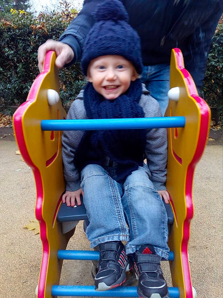 Kameron participe au concours pour gagner de l'argent avec cette photo : child, fun, headwear, joy, leisure, outdoor_play_equipment, person, play, playground, playground_slide, product, public_space, recreation, toddler, toy, vacation