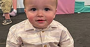 Ace joined the competition — help win amazing prizes! toddler, child, indoor, playroom, soft_play, colorful, spiky_hair, striped_shirt, orange_shorts, floor_mat, person, adult, legs, shoes, wall_art, sun_painting, casual_clothing, smiling, cute, sitting