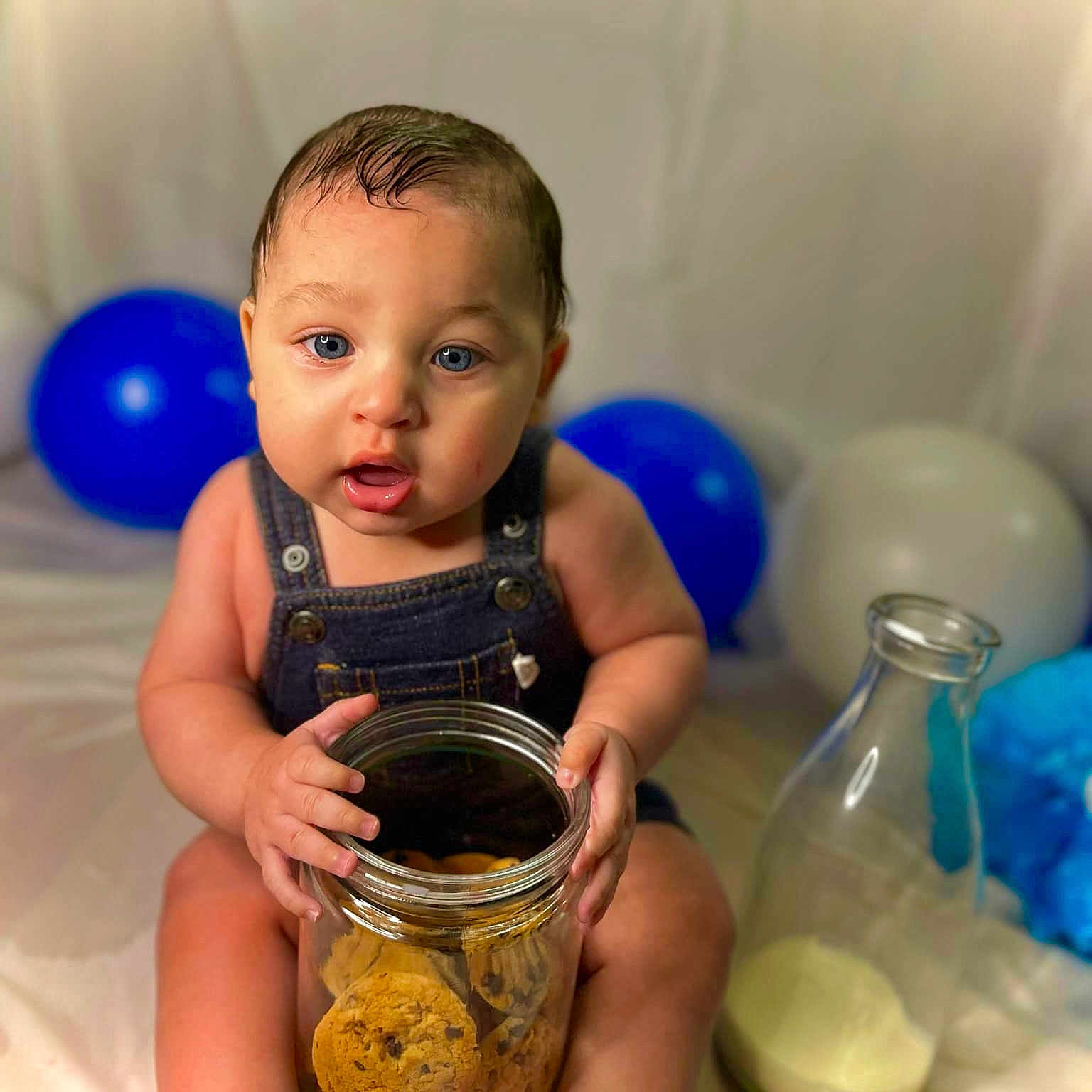 Donmanick is registered to the contest to win money with this photo: baby, clothing, face, food, head, jar, masonjar, medication, person, photography, pill, portrait, sitting, sleeve