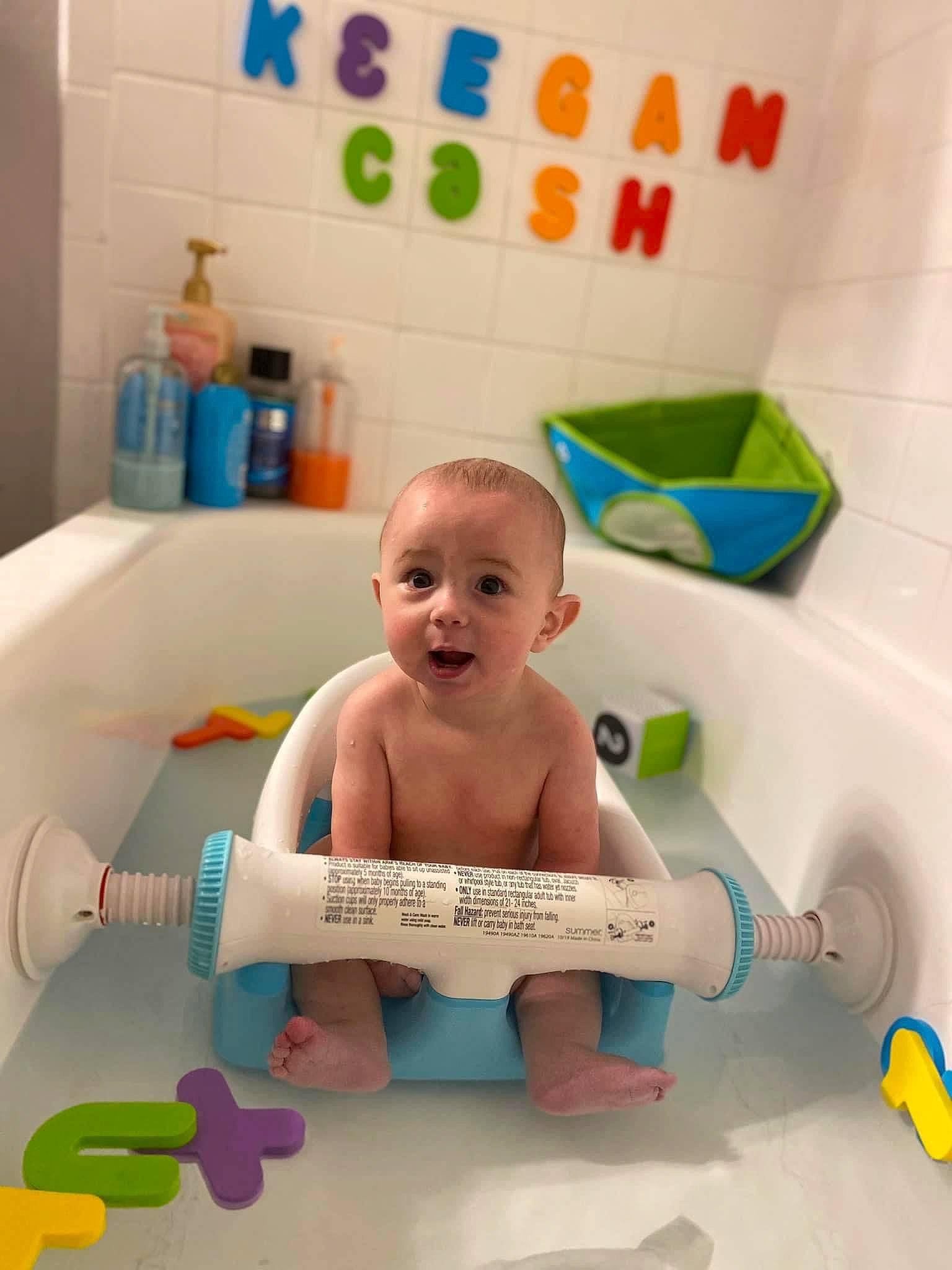 Keegan joined the competition — help win amazing prizes! aqua, baby, baby_bathing, baby_playing_with_toys, baby_products, baby_safety, bathing, bathroom, bathtub, child, flooring, fun, happy, leisure, person, plumbing, product, room, smile, surprise