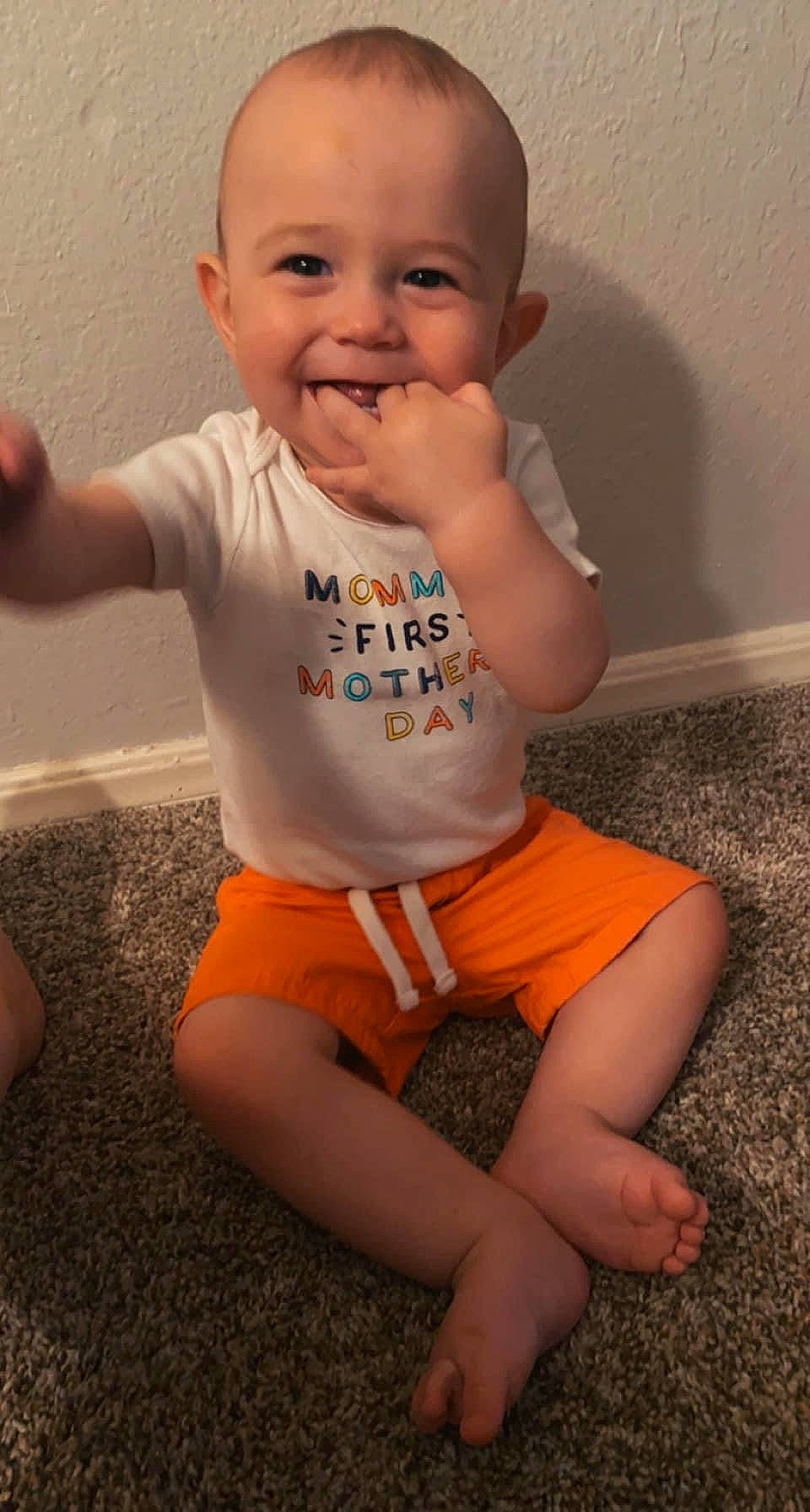 Keegan is registered to the contest to win money with this photo: baby_toddler_clothing, cheek, chin, eye, face, facial_expression, hair, hairstyle, head, human_body, joint, joy, leg, mouth, neck, nose, organ, person, skin, sleeve