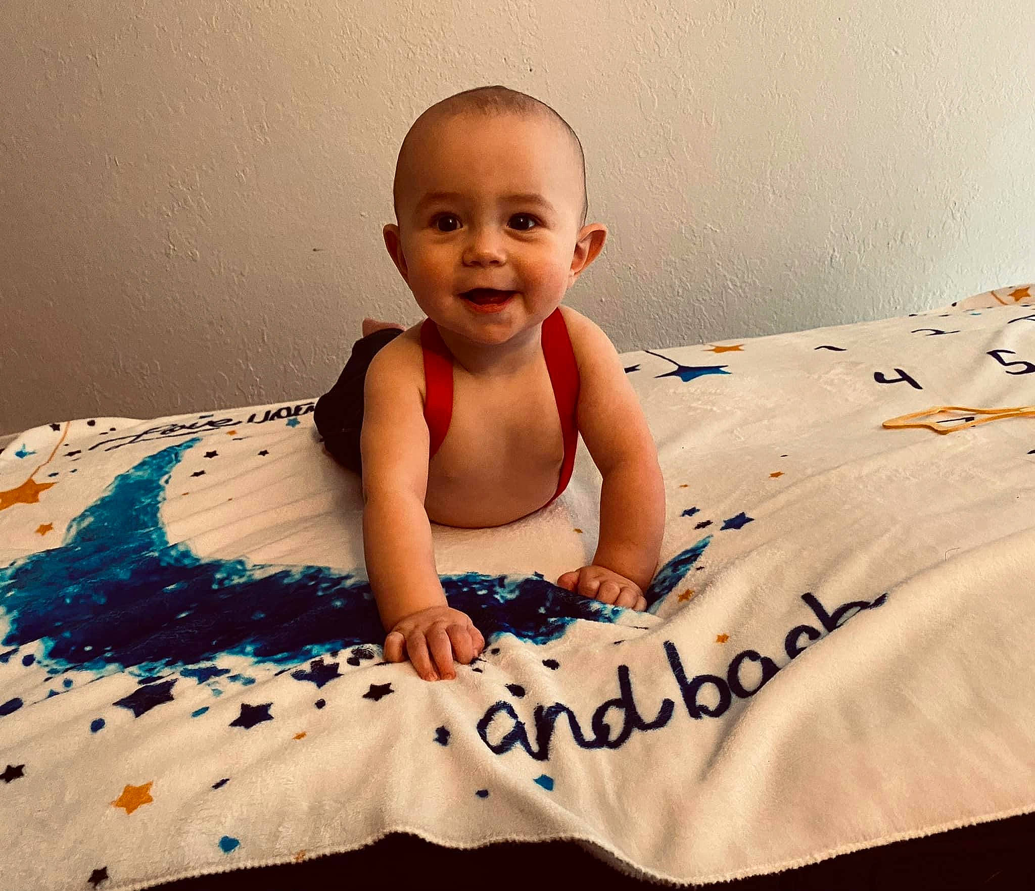 Keegan joined the competition — help win amazing prizes! arm, baby, baby_toddler_clothing, beauty, bedding, child, comfort, cool, finger, flash_photography, fun, happy, joy, linens, pattern, person, sitting, sleeve, smile, stomach