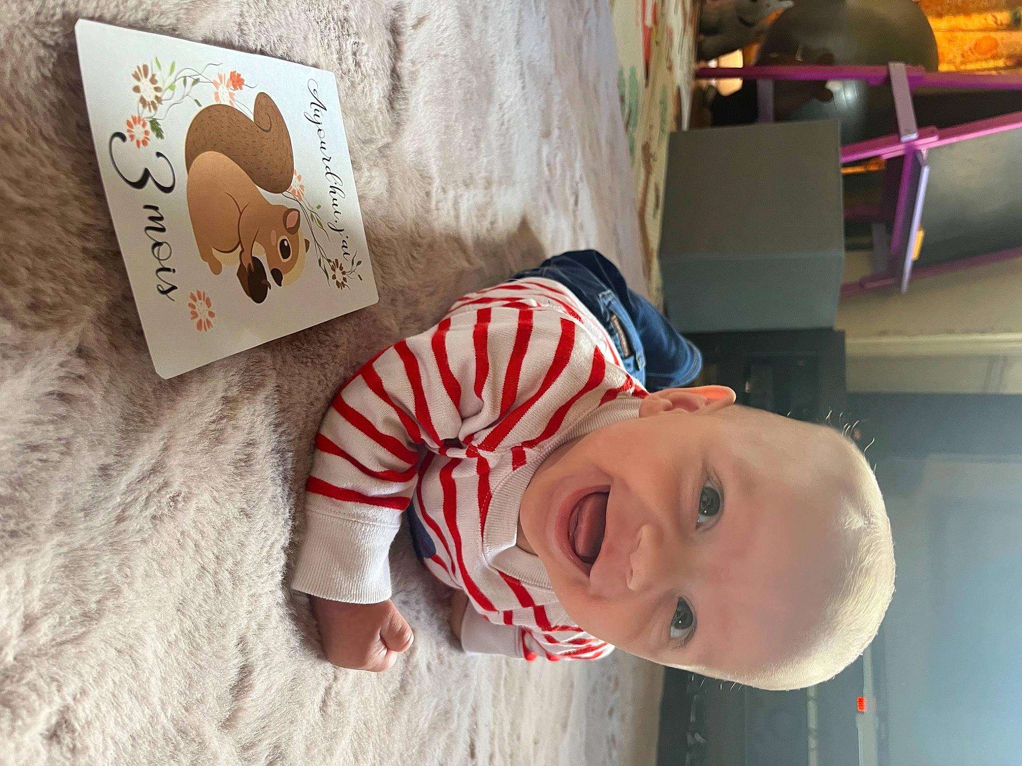 Marcel a rejoint le concours — aidez-le/la à gagner de superbes lots ! baby, baby_toddler_clothing, carmine, cheek, child, eye, fun, happy, hat, nose, paper_product, pattern, person, room, shelf, sleeve, textile, toddler, tree, visual_arts