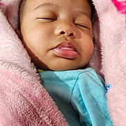 Trinity is registered to the contest to win money with this photo: adorable, baby, blanket, blue_clothing, child, closeup, cozy, cute, face, indoor, infant, peaceful, pink, portrait, resting, sleeping, soft_texture, tongue, warm, wrapped