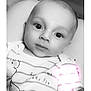 baby, infant, portrait, black_and_white, face, eyes, clothing, striped_shirt, cartoon, cute, child, newborn, lying_down, soft_lighting, indoors, closeup, person, smile, expression, toddler