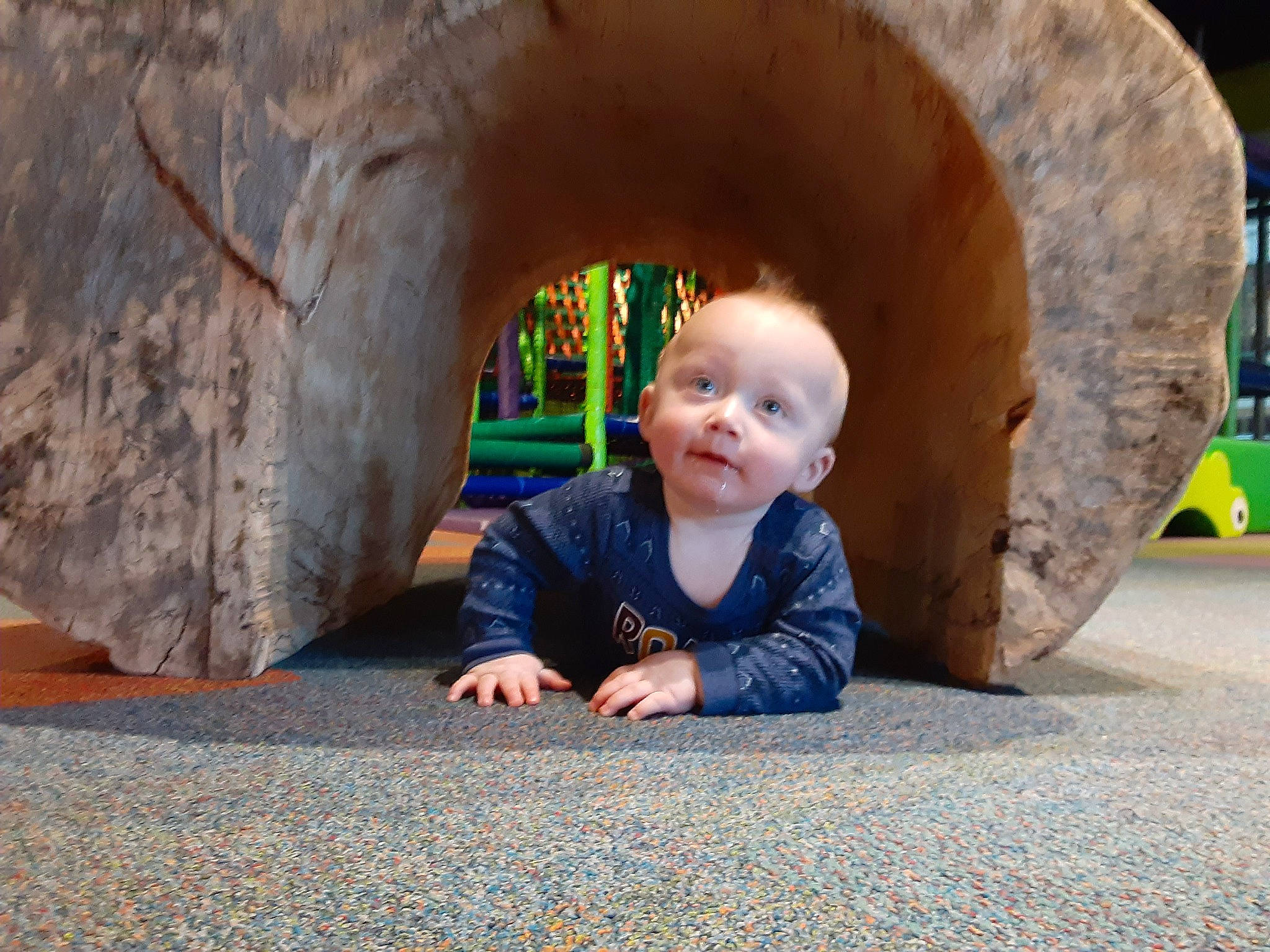 Blaine is registered to the contest to win money with this photo: baby, baby_toddler_clothing, child, city, comfort, crawling, flooring, fun, grass, human_settlement, infrastructure, leaf, leisure, nose, person, plant, public_space, road_surface, toddler, tree