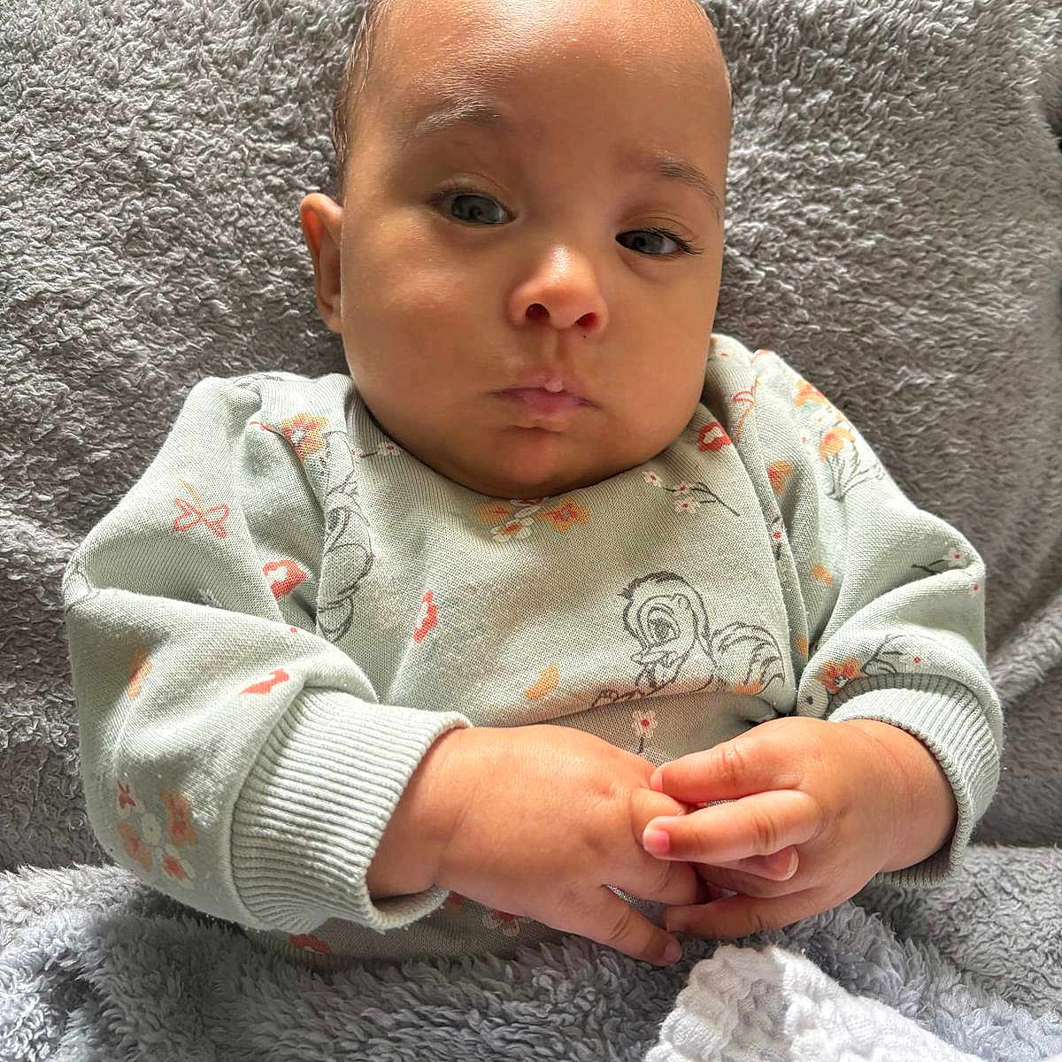 Ari joined the competition — help win amazing prizes! baby, blanket, bodypart, clothing, cushion, face, finger, hand, head, homedecor, knitwear, newborn, person, photography, portrait, quilt, sitting, sleeve, spitting, sweater