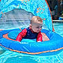 baby, blue, canopy, child, float, fun, infant, inflatable, orange, outdoor, pool, recreation, smiling, splash, summer, sunny, swim, swimsuit, water, water_sports