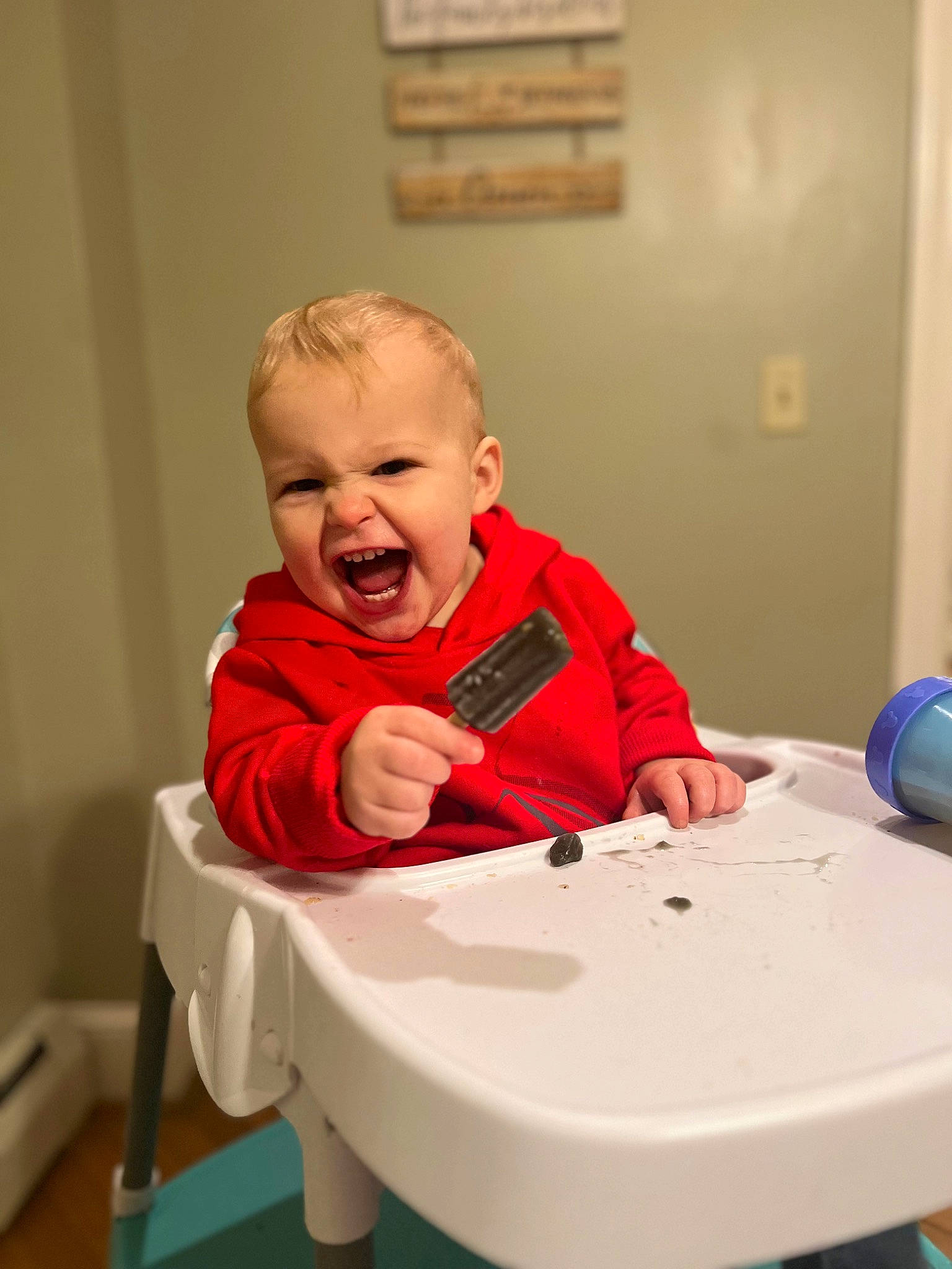 Declan joined the competition — help win amazing prizes! anger, baby, baby_toddler_clothing, carmine, chair, cheek, child, comfort, fun, happy, jacket, laugh, person, plastic, play, room, sitting, sleeve, smile, t_shirt