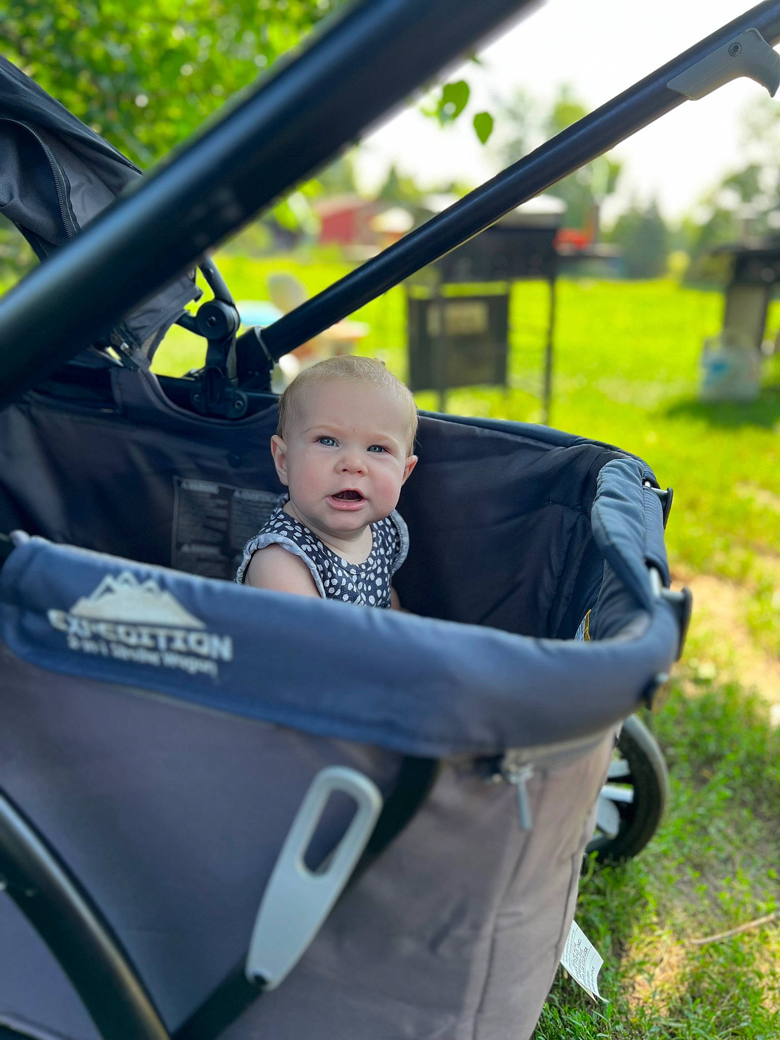 Emilia joined the competition — help win amazing prizes! auto_part, automotive_design, automotive_exterior, automotive_tire, automotive_wheel_system, baby, baby_carriage, grass, leisure, motor_vehicle, person, plant, recreation, rim, spoke, tire, toddler, tree, vehicle, wheel