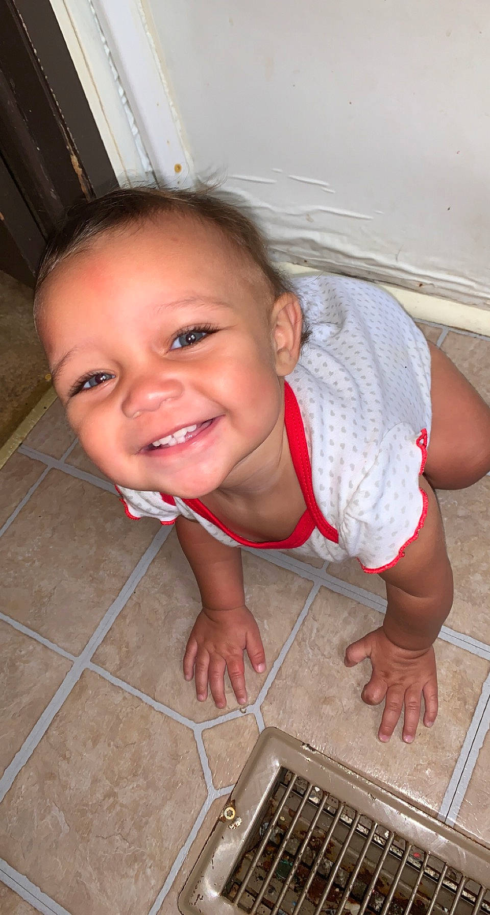 Kaelynn is registered to the contest to win money with this photo: cheek, eye, finger, floor, flooring, hand, happy, hardwood, joy, leg, mammal, mouth, nose, organ, person, pink, product, skin, smile, thumb