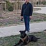 Mombo a rejoint le concours — aidez-le/la à gagner de superbes lots ! accessories, adult, animal, canine, clothing, coat, dog, labradorretriever, leash, longsleeve, male, man, pants, person, pet, policedog, slate, sleeve, strap, walkingdog