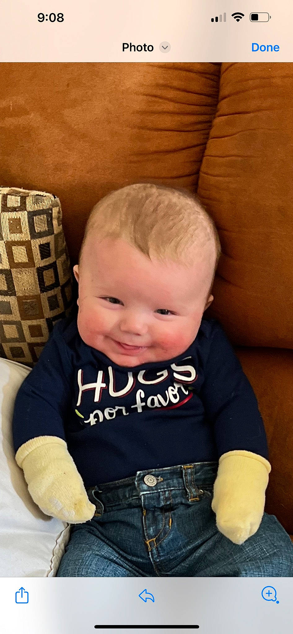 Isaiah joined the competition — help win amazing prizes! baby, baby_toddler_clothing, cheek, child, clothing, comfort, couch, eye, hairstyle, happy, head, jeans, joy, person, room, sitting, skin, sleeve, smile, t_shirt