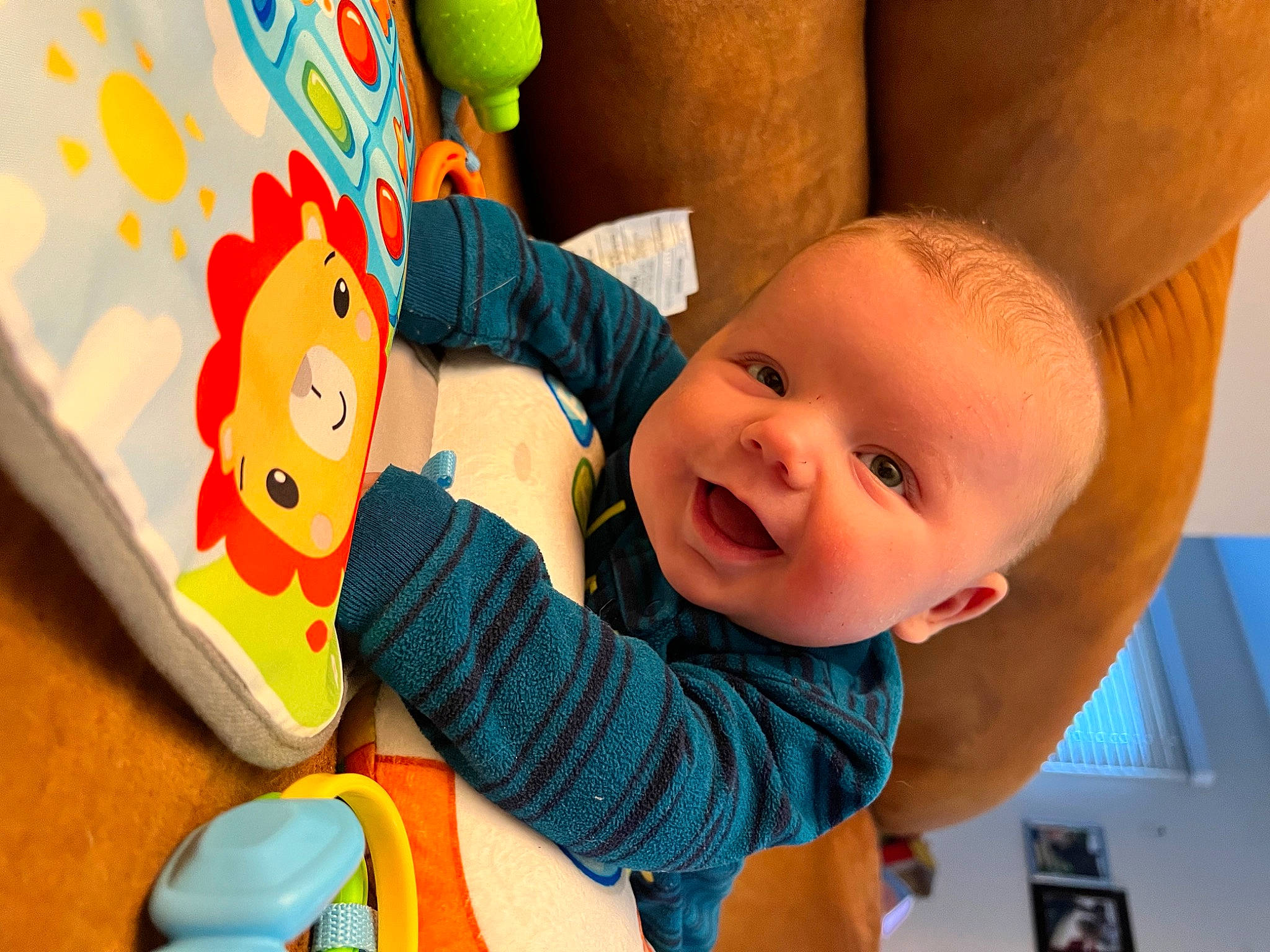 Isaiah joined the competition — help win amazing prizes! baby, baby_playing_with_toys, baby_products, baby_toddler_clothing, cheek, child, eye, facial_expression, finger, fun, happy, leisure, nose, person, play, room, skin, smile, textile, toddler