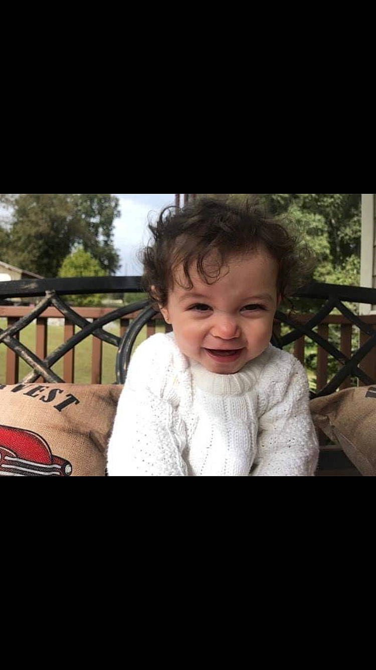 Anniston joined the competition — help win amazing prizes! cheek, child, cool, ear, eye, face, facial_expression, fun, head, human, nose, people, person, photo_caption, photograph, photography, skin, sky, smile, snapshot