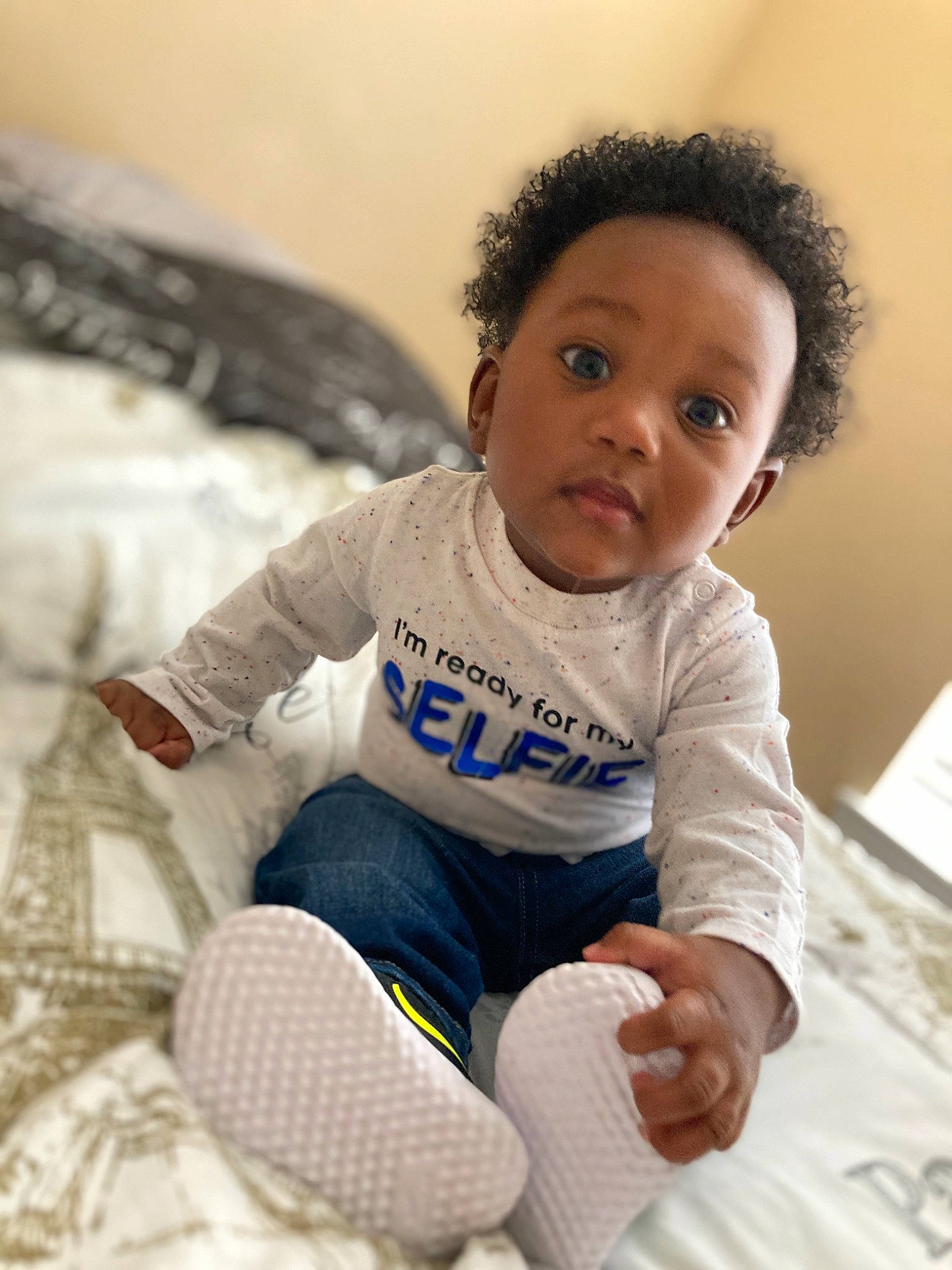 Javon is registered to the contest to win money with this photo: ankle, baby, baby_toddler_clothing, child, finger, foot, hand, knee, lap, person, sock, toddler