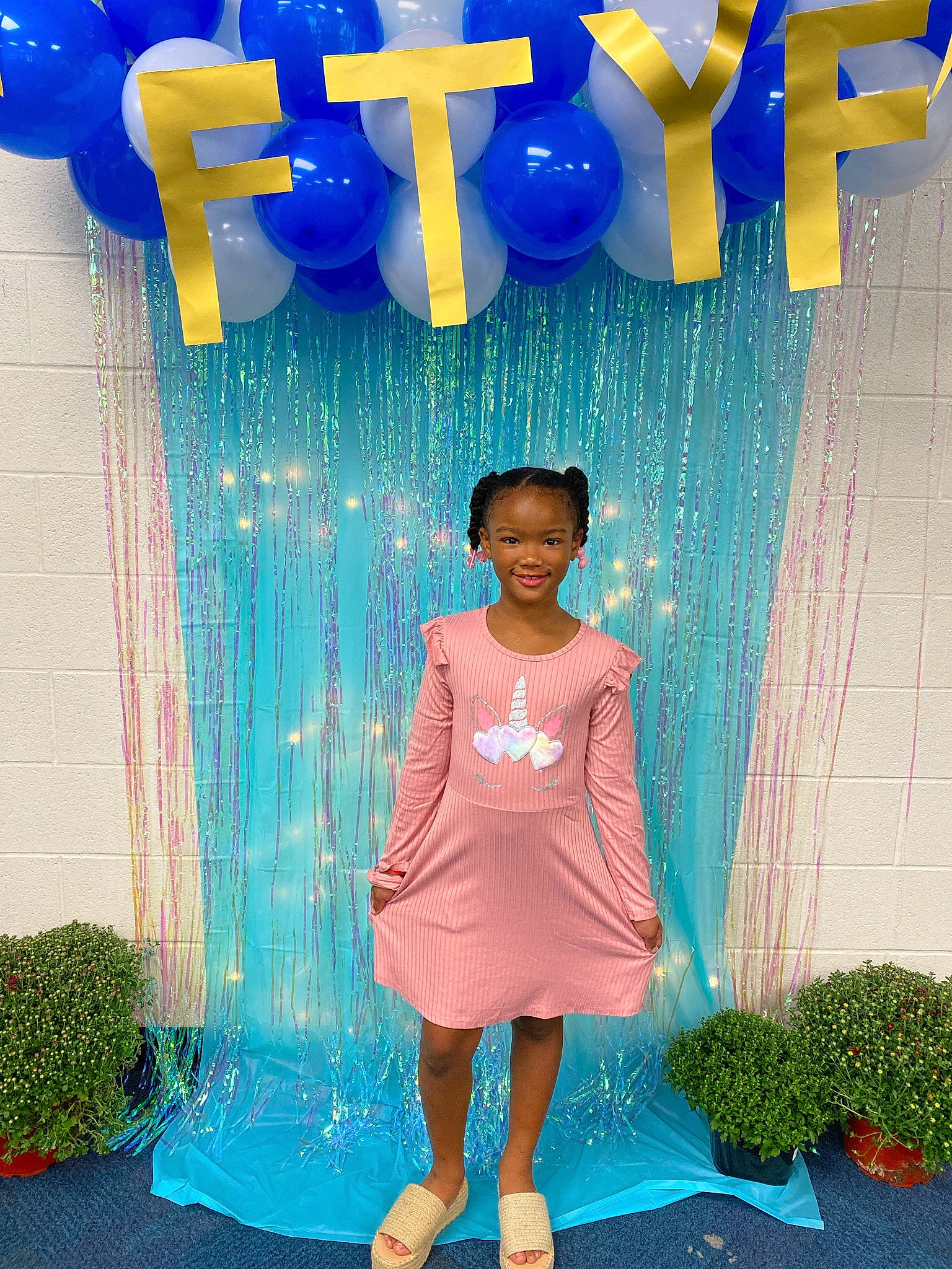 Adrienne is registered to the contest to win money with this photo: aqua, azure, balloon, blue, dress, flowerpot, green, happy, joy, leisure, light, organ, person, photograph, pink, plant, red, smile, standing, textile