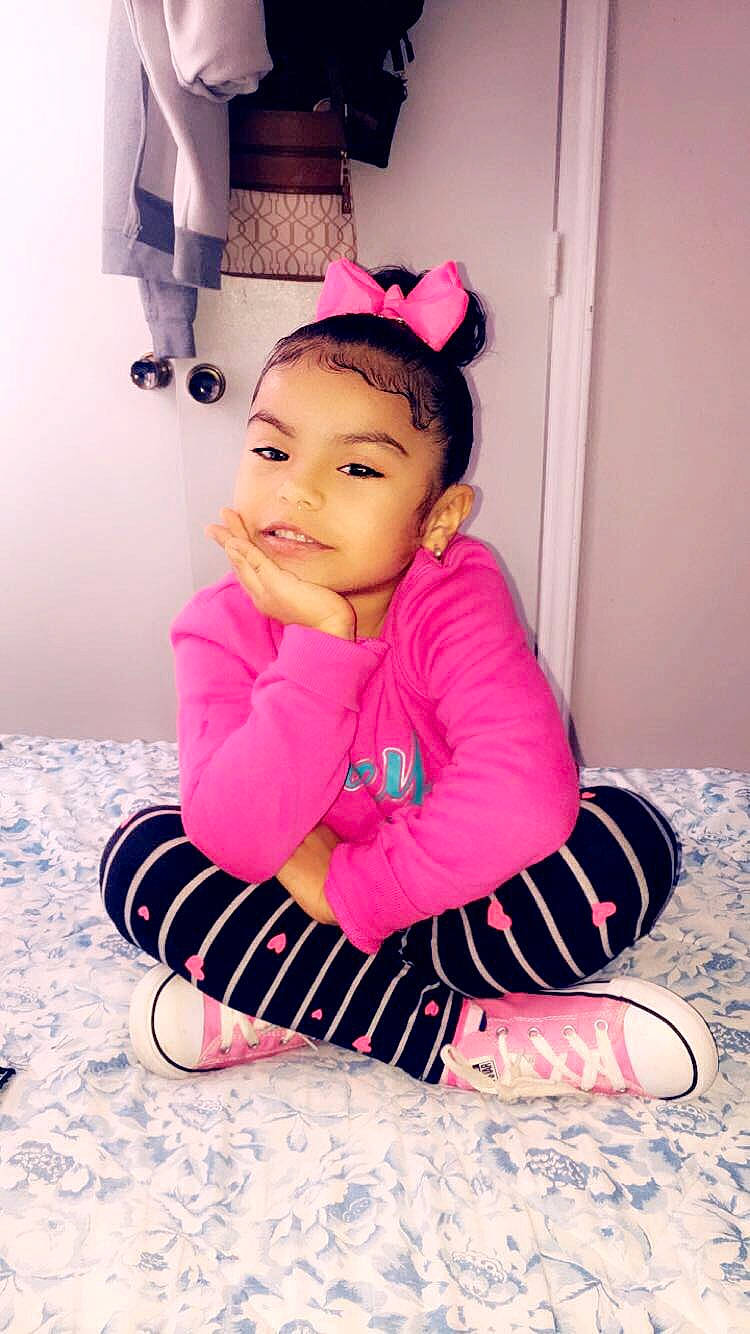 Lesly joined the competition — help win amazing prizes! baby, baby_toddler_clothing, child, child_model, costume_accessory, hair_accessory, headgear, magenta, person, photo_shoot, pink, shoe, sitting, sock, toddler