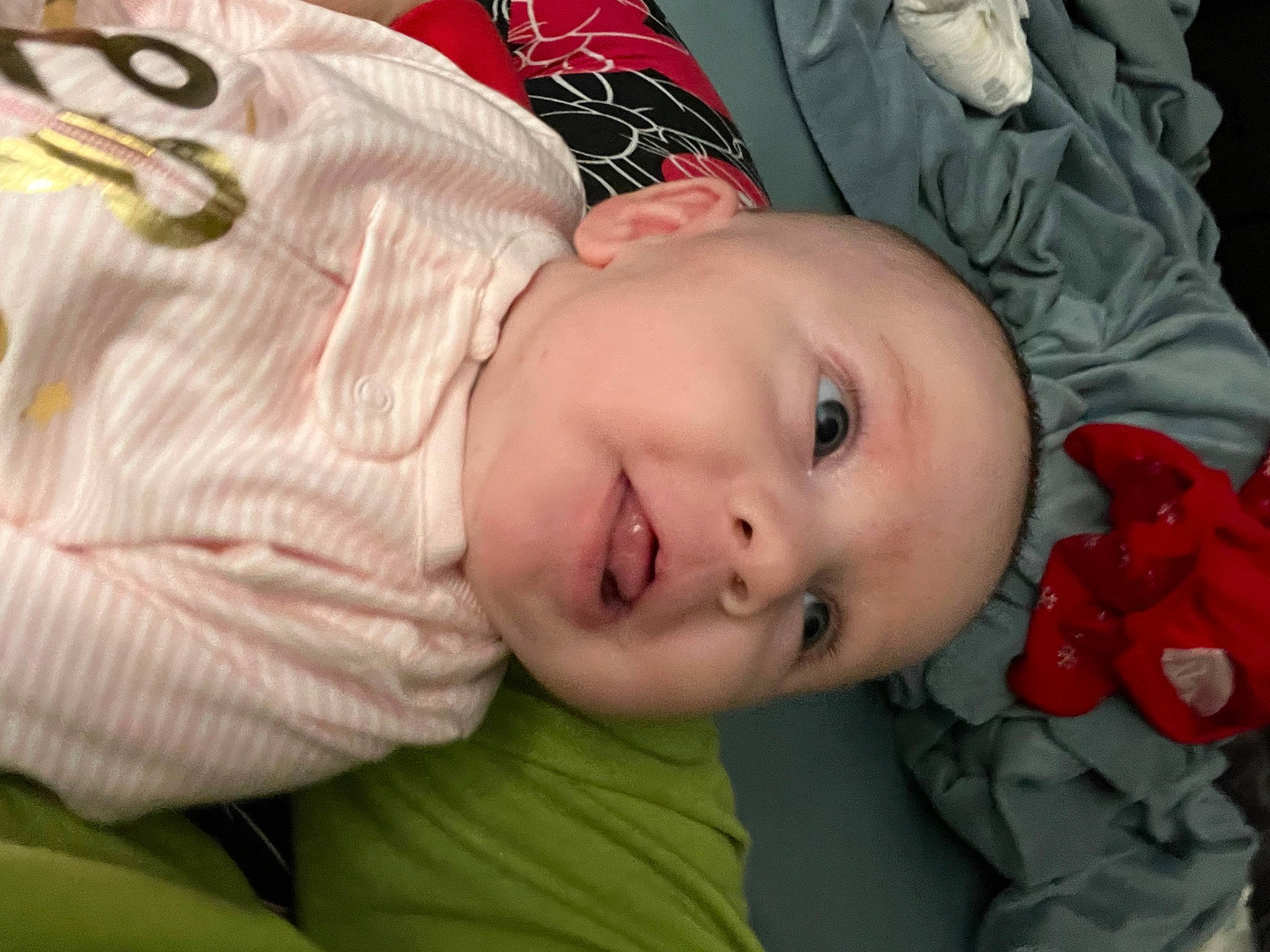 Leia is registered to the contest to win money with this photo: baby, baby_toddler_clothing, cheek, child, chin, cool, eye, eyebrow, facial_expression, happy, head, iris, lip, mouth, nose, person, skin, sleeve, smile, textile