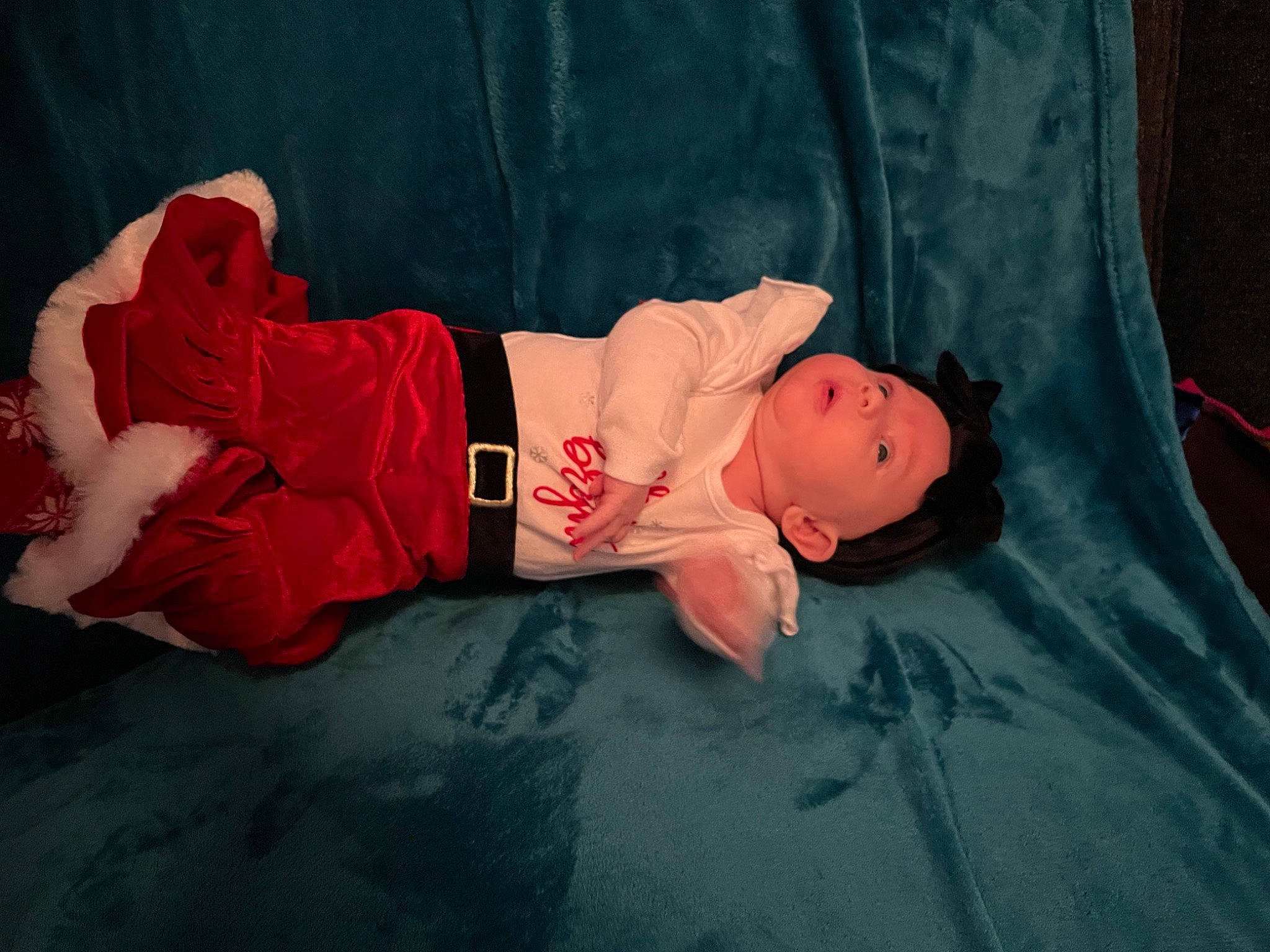 Leia joined the competition — help win amazing prizes! baby, baby_products, baby_toddler_clothing, carmine, child, comfort, flooring, fun, grass, headwear, human_leg, knee, leisure, linens, person, room, sitting, sleeve, sock, t_shirt