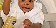 Olakamiye joined the competition — help win amazing prizes! baby, infant, towel, white_towel, baby_bath, bath_seat, mustela, baby_skincare, smiling, happy, child, cute, skin, moisturizer, cream, bottle, baby_clothing, indoors, person, baby_care