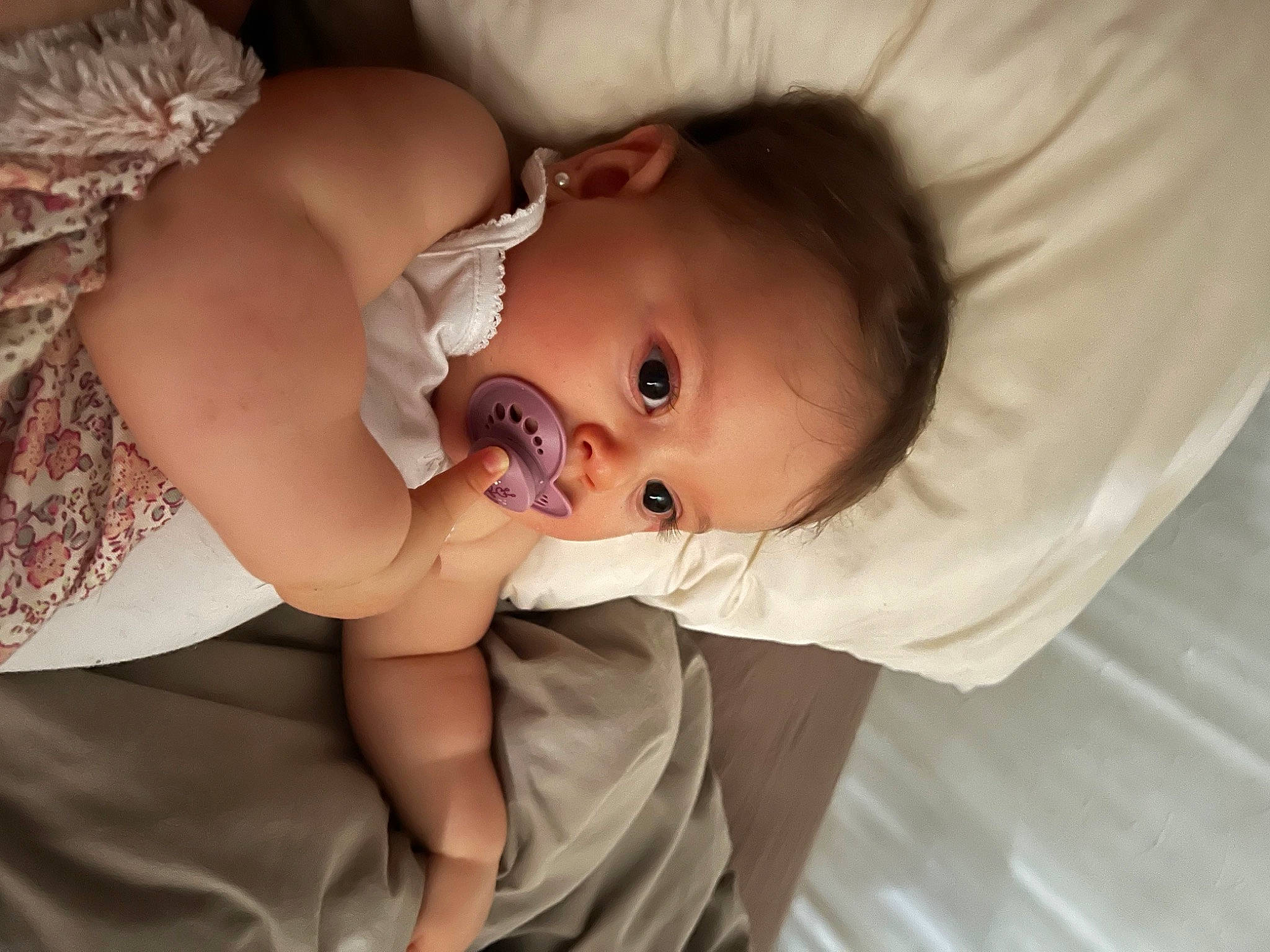 Kelssy participe au concours pour gagner de l'argent avec cette photo : arm, baby, baby_toddler_clothing, cheek, child, comfort, dress, eye, eyelash, finger, flash_photography, hand, happy, headgear, human_body, iris, lip, nose, person, skin