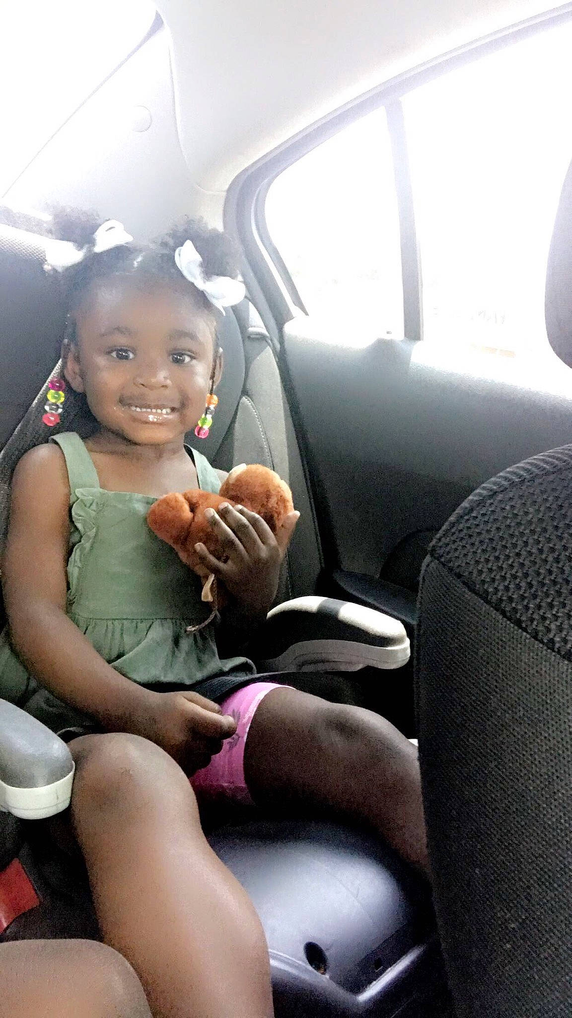 Jakayla is registered to the contest to win money with this photo: auto_part, automotive_design, car, car_seat, car_seat_cover, comfort, dress, happy, head_restraint, human_leg, joy, motor_vehicle, passenger, person, seat_belt, smile, thigh, thumb, toddler, vehicle