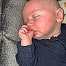 Jaxsyn is registered to the contest to win money with this photo: baby, sleeping, thumb_sucking, pajamas, couch, soft_texture, face, peaceful, infant, child, cozy, indoors, rest, cute, skin, head, hand, comfort, relaxation, portrait