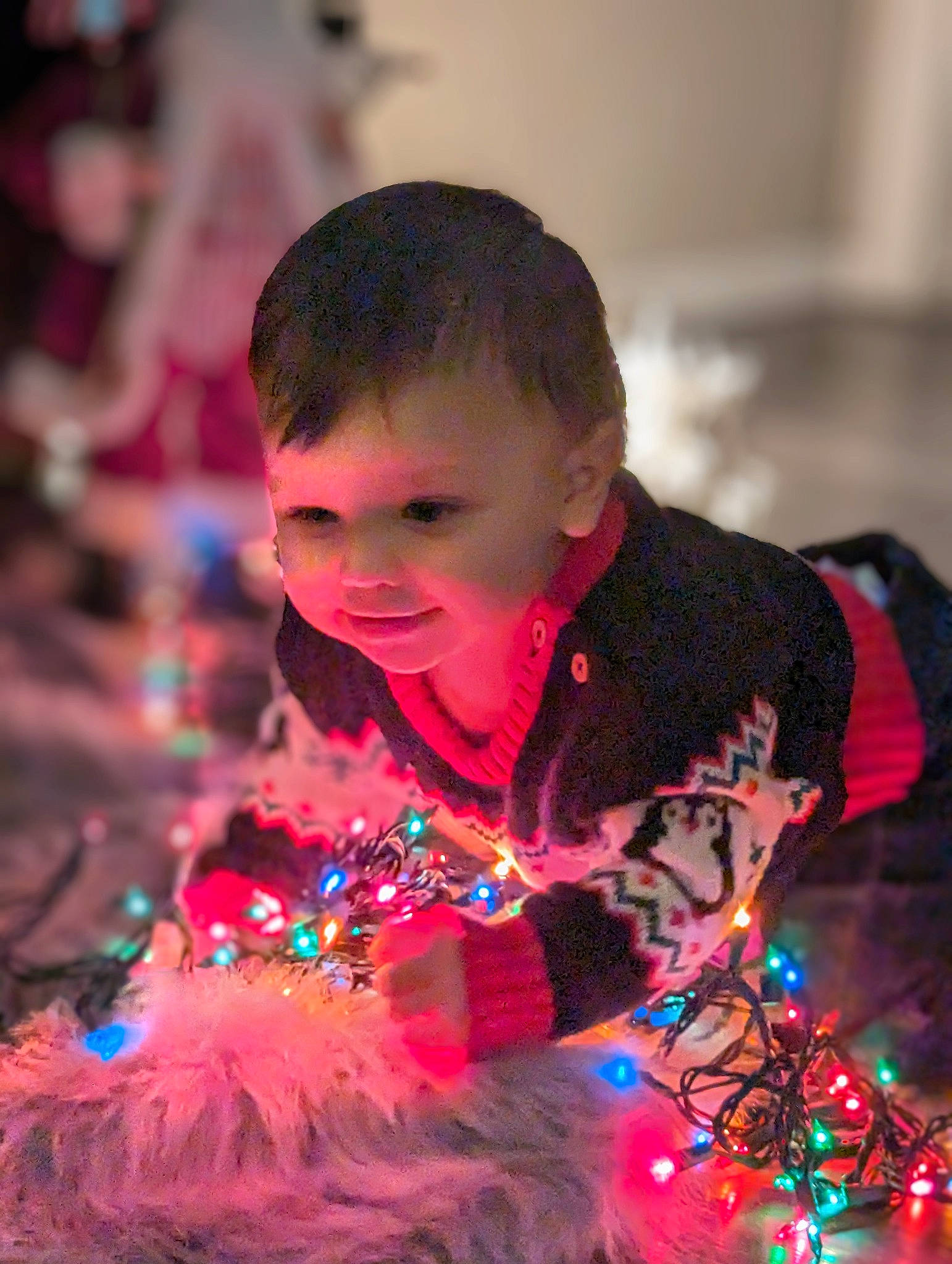 Griffin joined the competition — help win amazing prizes! christmas, christmas_decoration, christmas_eve, christmas_ornament, design, electric_blue, entertainment, event, fashion, fun, happy, holiday, human, magenta, party, person, pink, purple, toddler, tradition
