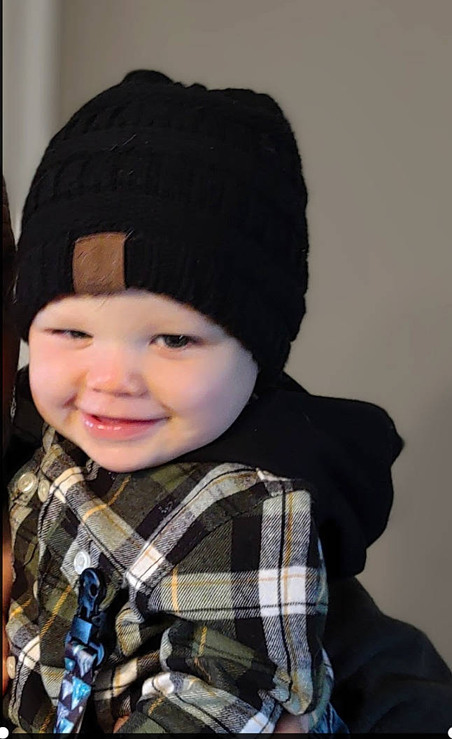 Griffin is registered to the contest to win money with this photo: beanie, cap, cheek, eyebrow, fashion_accessory, flash_photography, happy, headgear, headwear, joy, knit_cap, lip, outerwear, pattern, person, plaid, sleeve, smile, tartan, textile