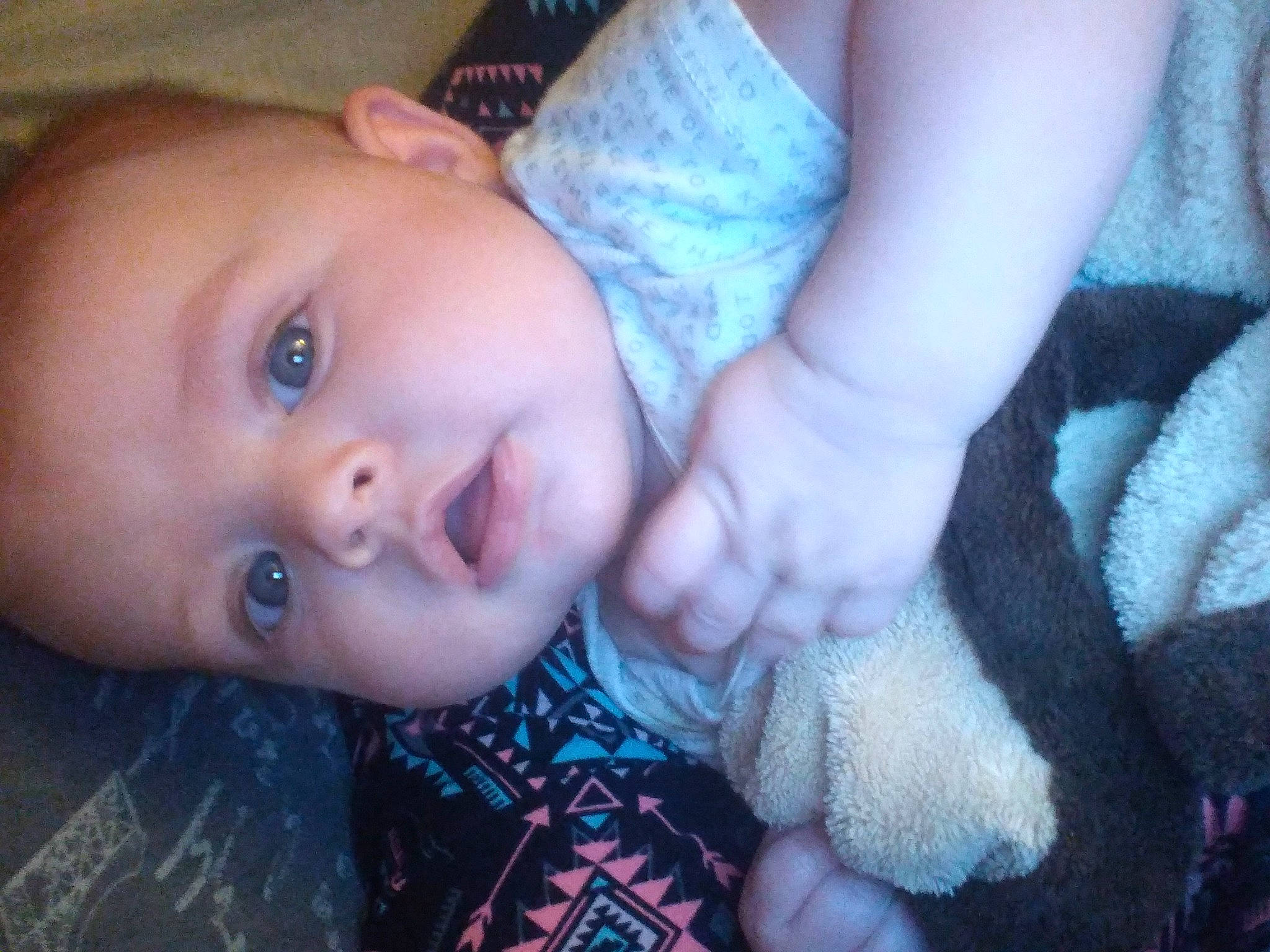 Desiree is registered to the contest to win money with this photo: baby, baby_toddler_clothing, cheek, finger, flash_photography, gesture, happy, human_body, iris, lip, mammal, mouth, nose, person, plant, skin, smile, textile, toddler, tree