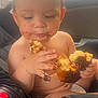 toddler, child, car_seat, chocolate, pastry, messy, food, face, hands, indoor, seatbelt, hair, skin, eating, cute, baby, snack, closeup, seat, window