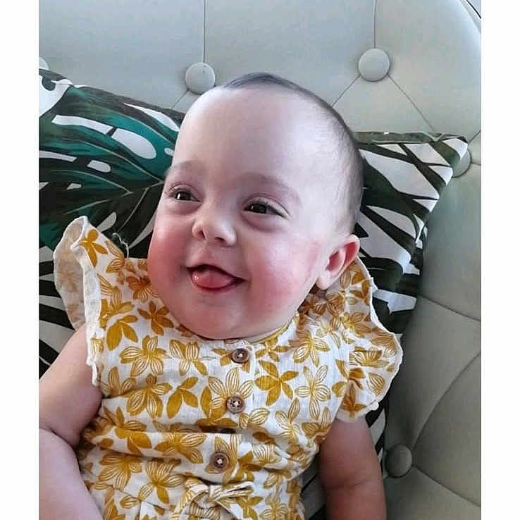 Livia a rejoint le concours — aidez-le/la à gagner de superbes lots ! baby, bodypart, clothing, crib, cushion, dress, face, furniture, happy, head, homedecor, infantbed, laughing, newborn, person, photography, portrait, sitting, sleeping, text