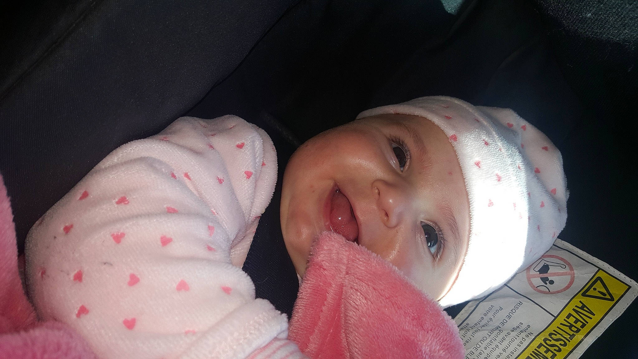 Emily participe au concours pour gagner de l'argent avec cette photo : baby, bedtime, birth, cheek, child, headwear, lip, mouth, nose, person, pink, skin, sleep, smile, toddler
