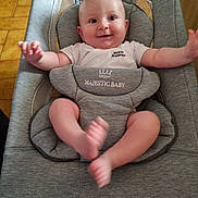 Sasha a rejoint le concours — aidez-le/la à gagner de superbes lots ! baby, infant, smiling, happy, onesie, baby_seat, grey, majestic_baby, petit_amour, cute, child, person, indoors, floor, tile_floor, playful, comfortable, young_child, baby_face, waving_arms